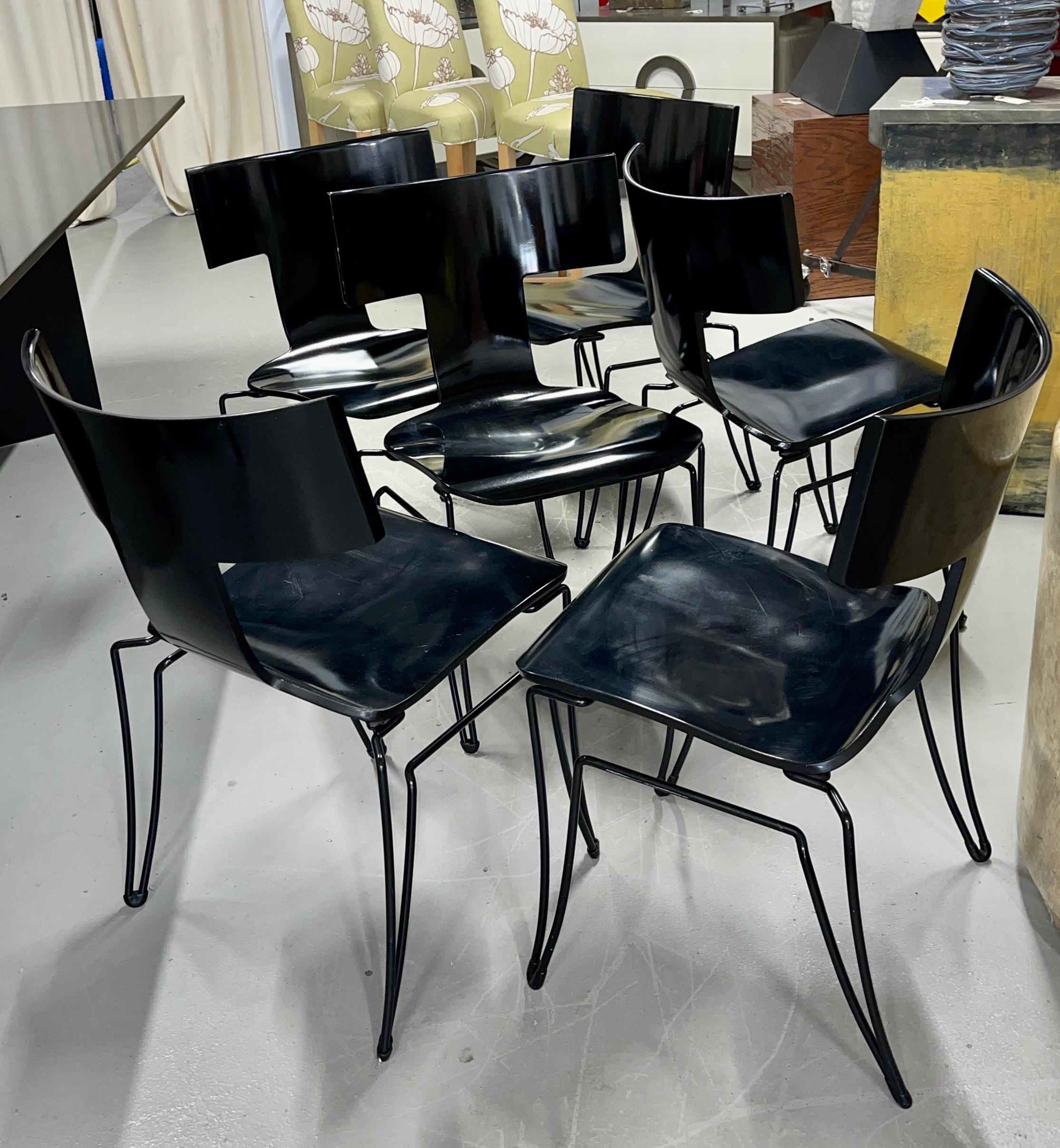 Beautiful set of 6 John Hutton designed Anziano chairs for Donghia. These chairs are in black with black painted metal legs. They are in good age appropriate condition, although there are marks to the seats and metal parts. We have photographed each