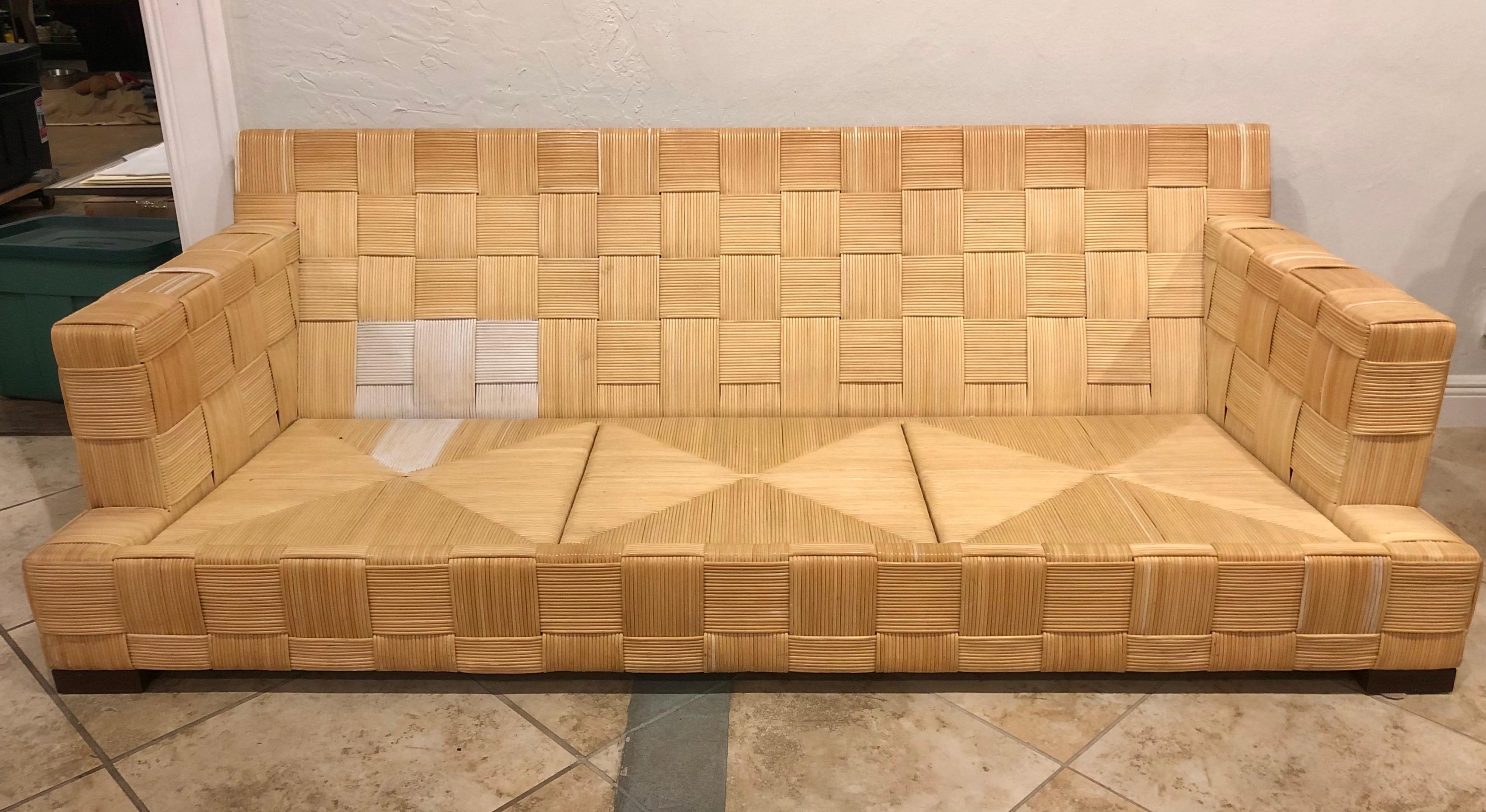 Donghia Block Island Collection sofa designed by John Hutton. Marked on bottom. Mahogany frame construction with stained mahogany accents. Very good condition.