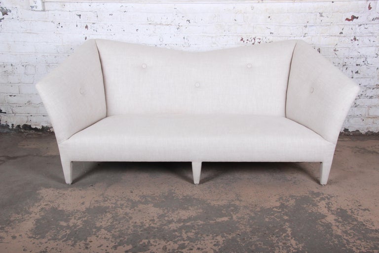 A gorgeous modern linen upholstered 