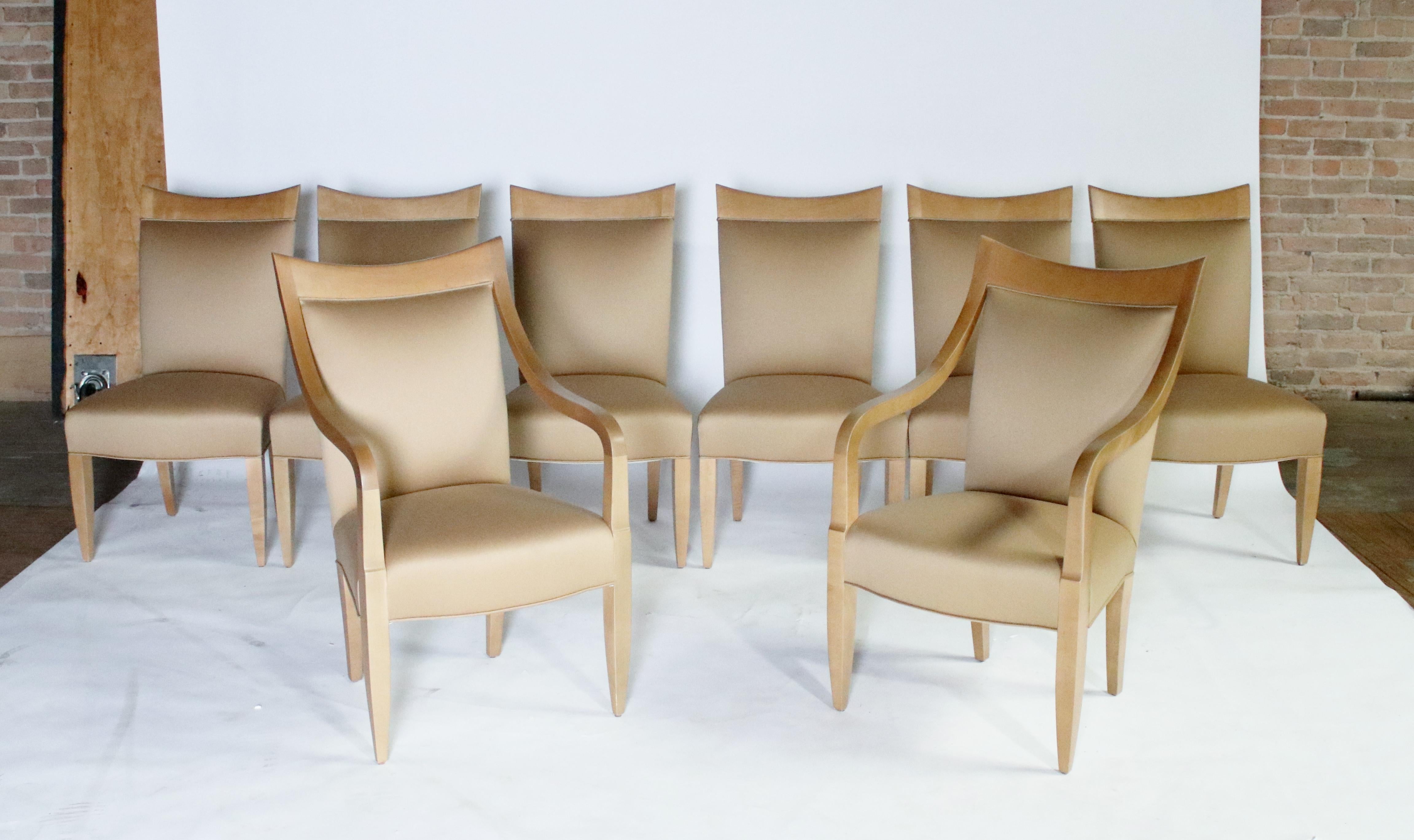 Set of 8 dining chairs designed by John Hutton for Donghia in a maple wood frame and beige color soft wool fabric in excellent condition. Set includes 2 armchairs and 6 side chairs.