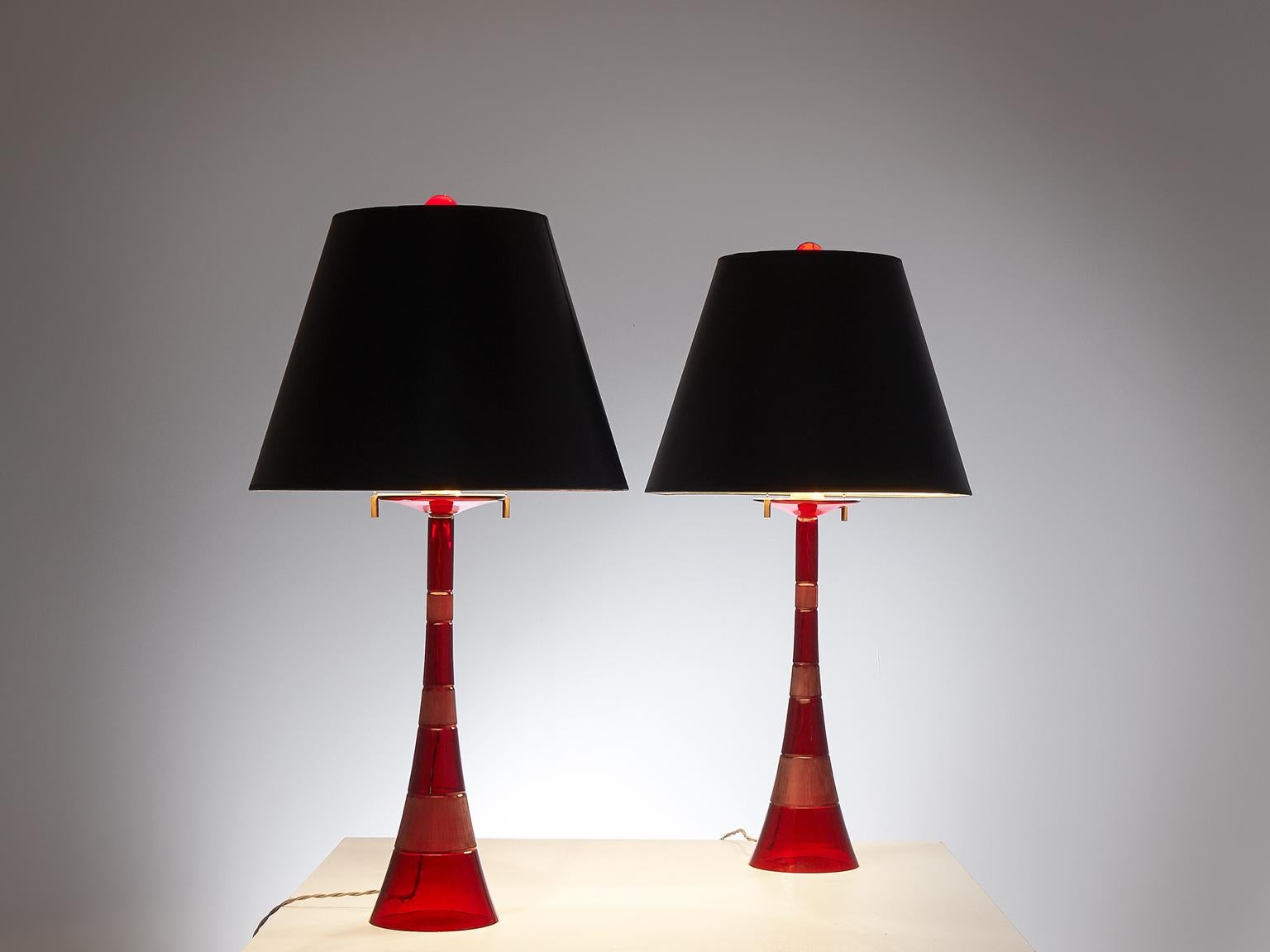 John Hutton for Donghia, pair of table lamps, red glass and acrylic shades, USA, 1980s.

This pair of hand blown glass table lamp is designed by John Hutton. It is not often that you come across a pair like this. They are built up elegantly, wider