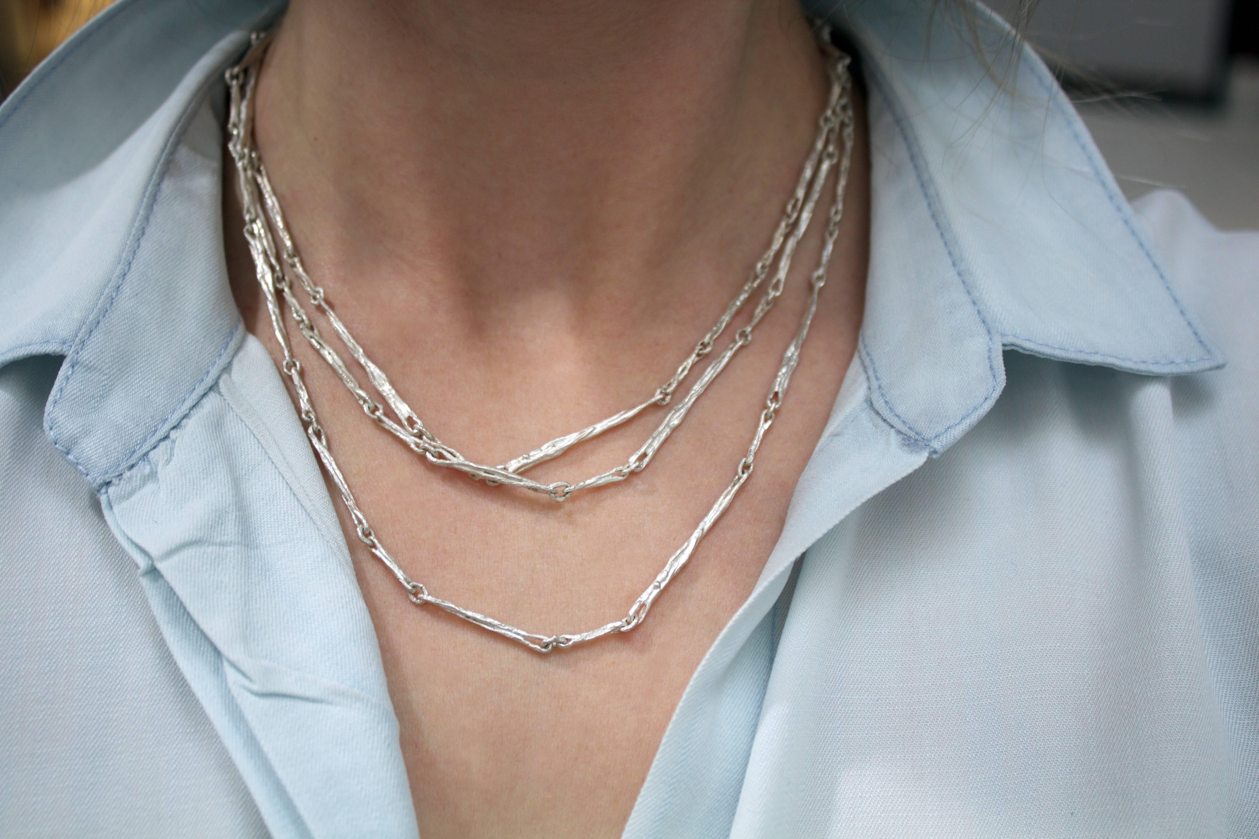 Multiwrap Chain Necklace handcrafted by renowned, award-winning jewelry artist John Iversen in white sterling silver with individually handmade and highly-textured organic stick elements and a nearly invisible and seamless 18k yellow gold clasp.