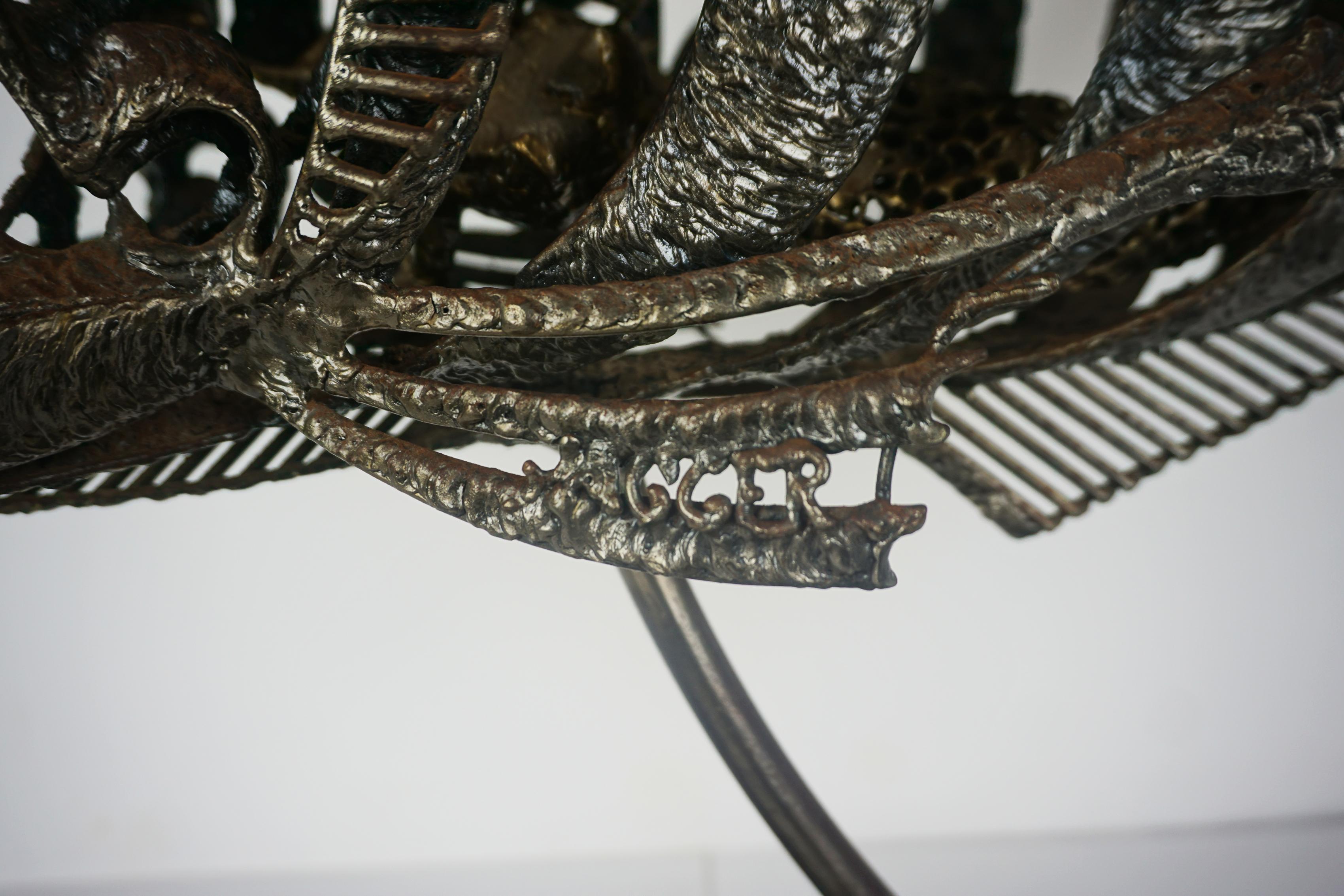 Original Brutalist Sculpture of a Mermaid inside a Rainbow Trout on Marble Base

Robert Azensky Fine Art is pleased to offer this striking sculpture by artist John Jagger (American, 1920 - 2013), 1989. This is a pieced steel representation of a