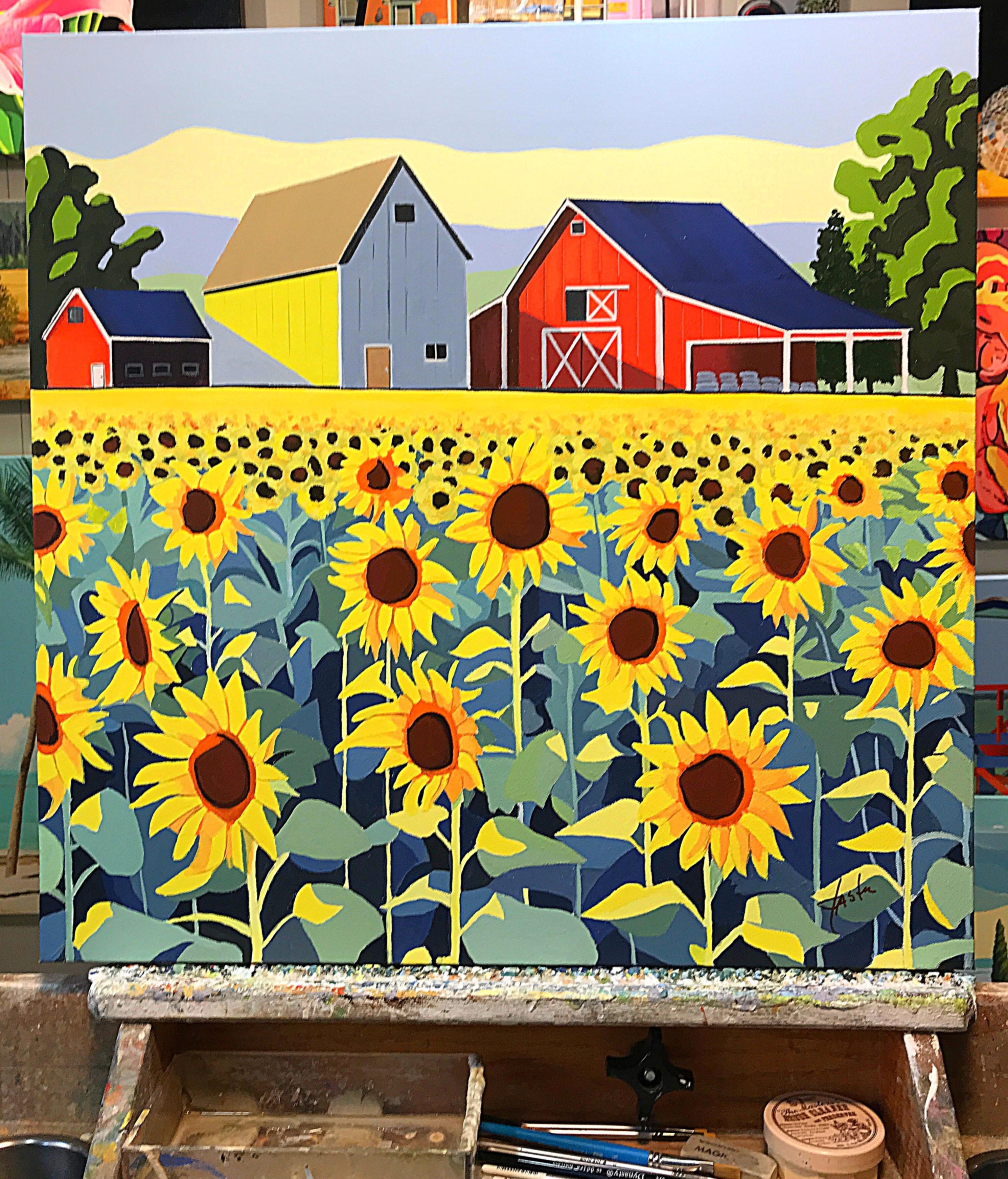 <p>Artist Comments<br />Sunflowers basking in the sunlight dominate the scene. At the top of the field, a red barn and a cluster of farm buildings rest beneath a blue summer sky, framed by green trees on either side. The vibrant colors and