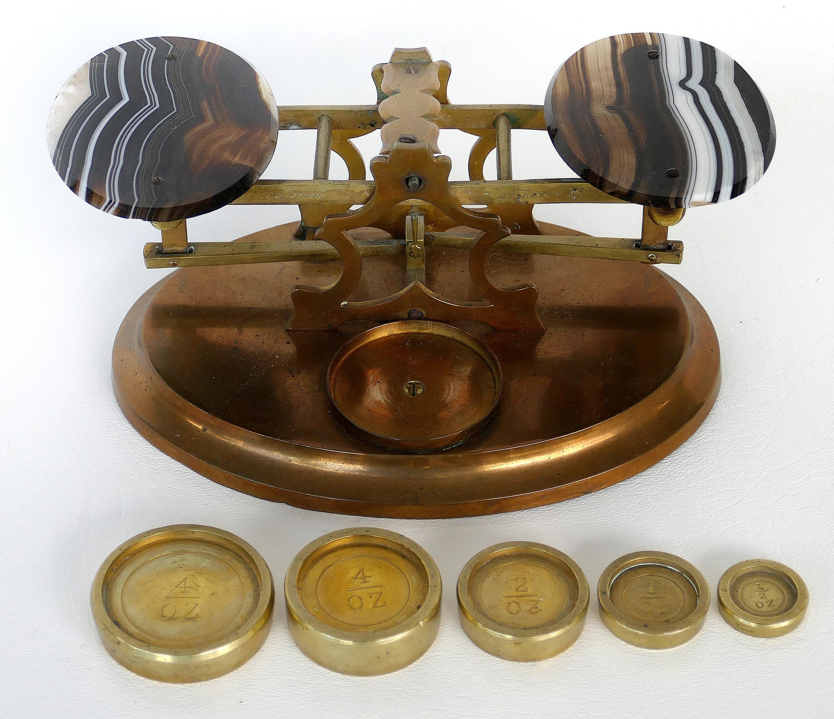 John Joseph Mechi brass and agate scales and weights, London 

Offered for sale is a fine mid-19th century brass and agate brass scale with brass weights in varying sizes by London based silversmith, banker and inventor John Joseph Mechi