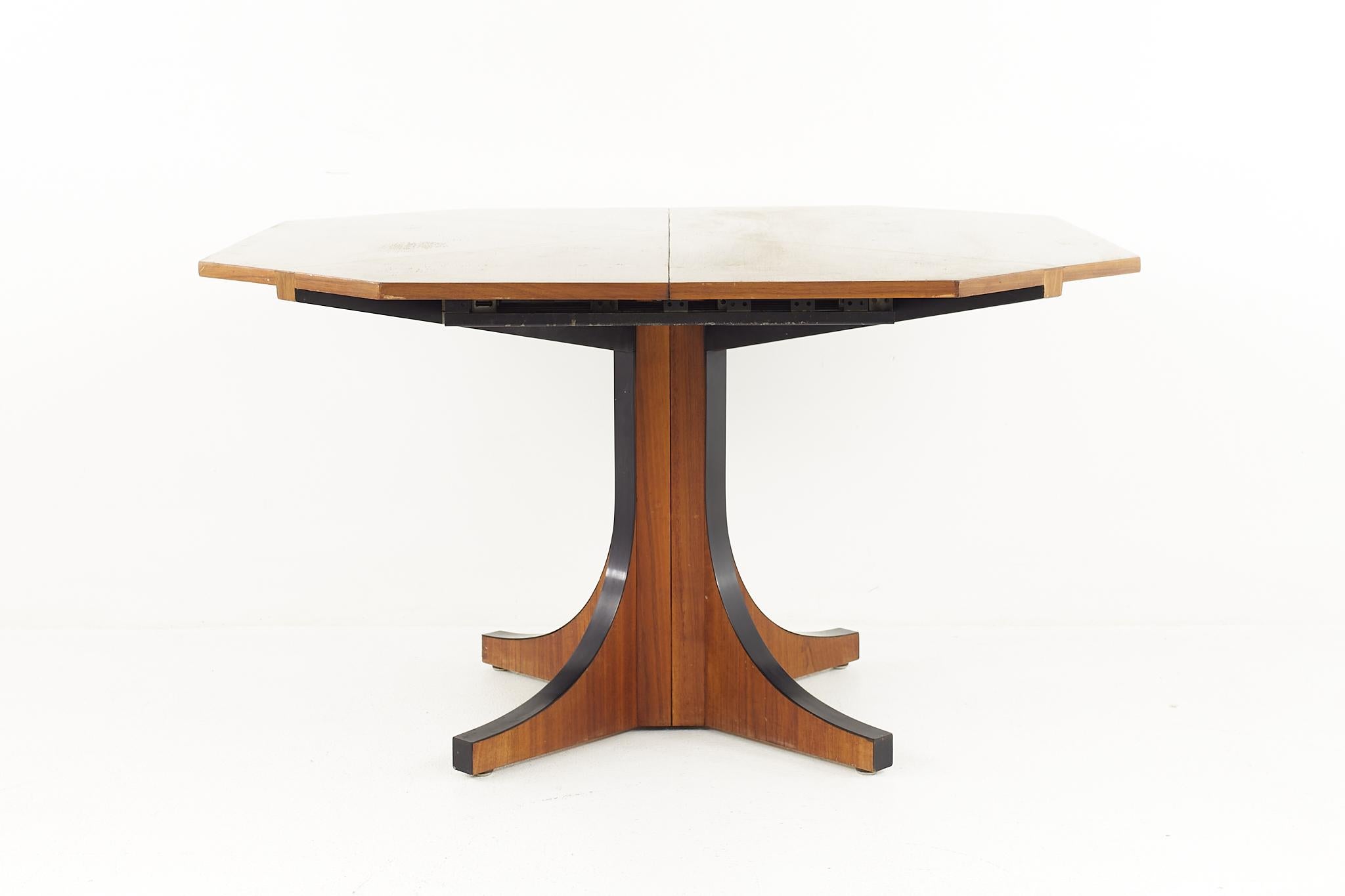 John Kapel for Glenn of California mid century walnut dining table

The table measures: 45.25 wide x 45.25 deep x 26.5 inches high, with a chair clearance of 25.5

All pieces of furniture can be had in what we call restored vintage condition.