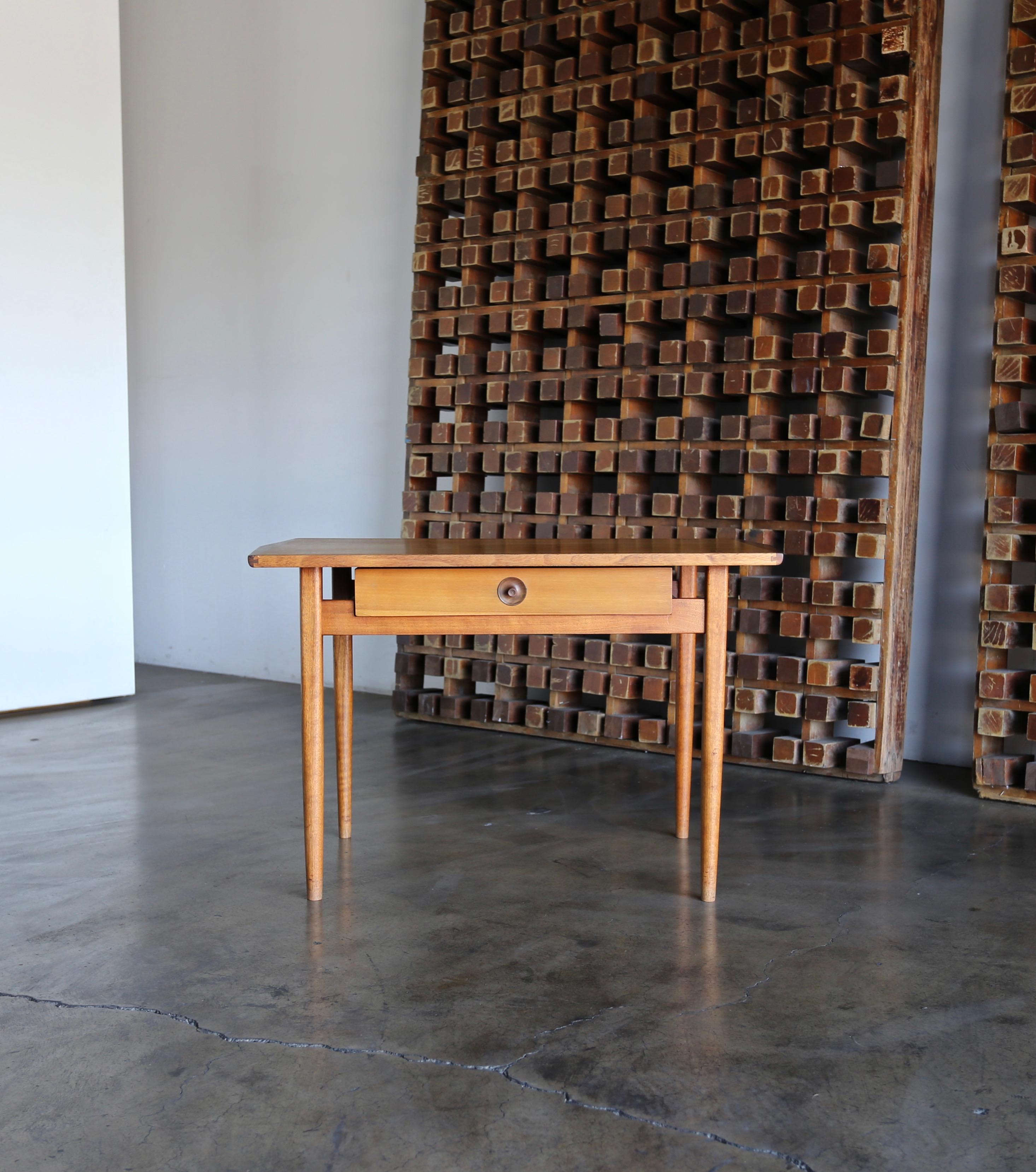 John Kapel handcrafted side / entry table, circa 1955. A fine example of California design.