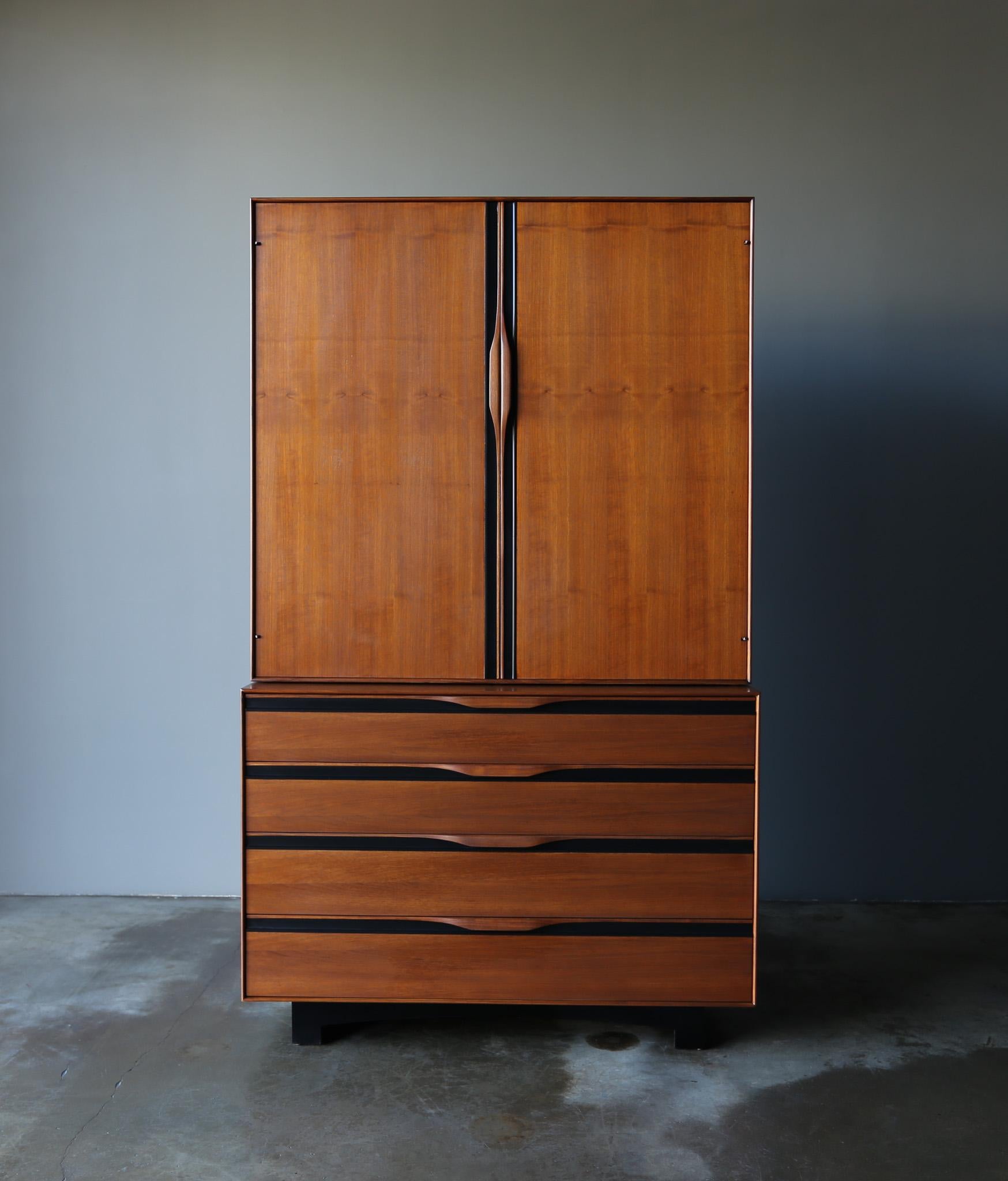 John Kapel Walnut Armoire / Gentleman's Chest for Glenn of California, United States, c.1970.  This piece has been professionally restored. 