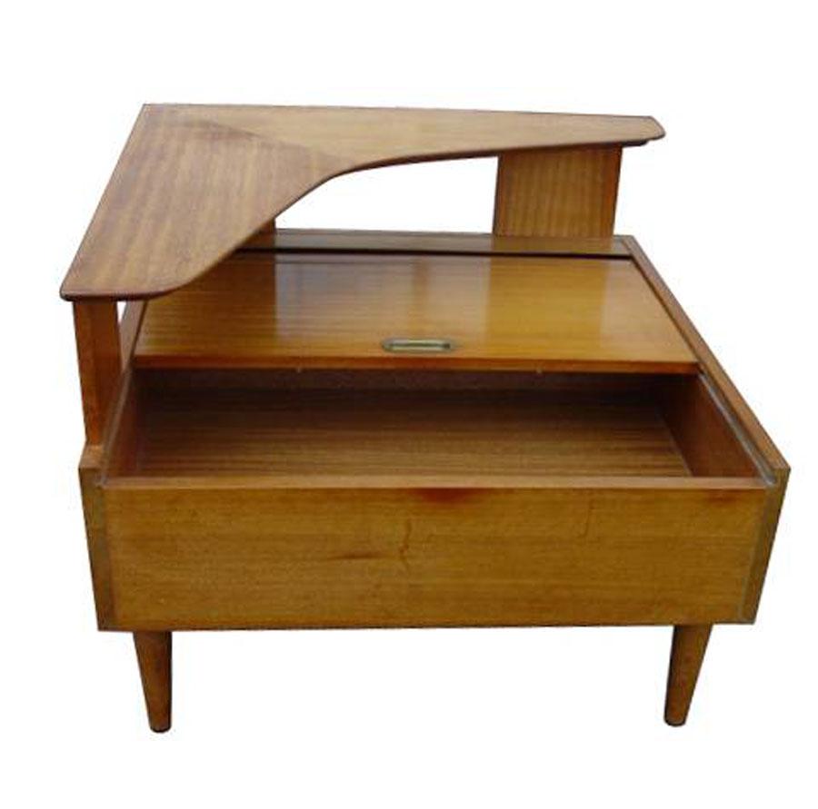 John Keal Brown Saltman Boomerang Occasional Corner Table
 
Bleached mahogany wood
 
Storage compartment with sliding scroll tambour door and brass handle

Tapered legs