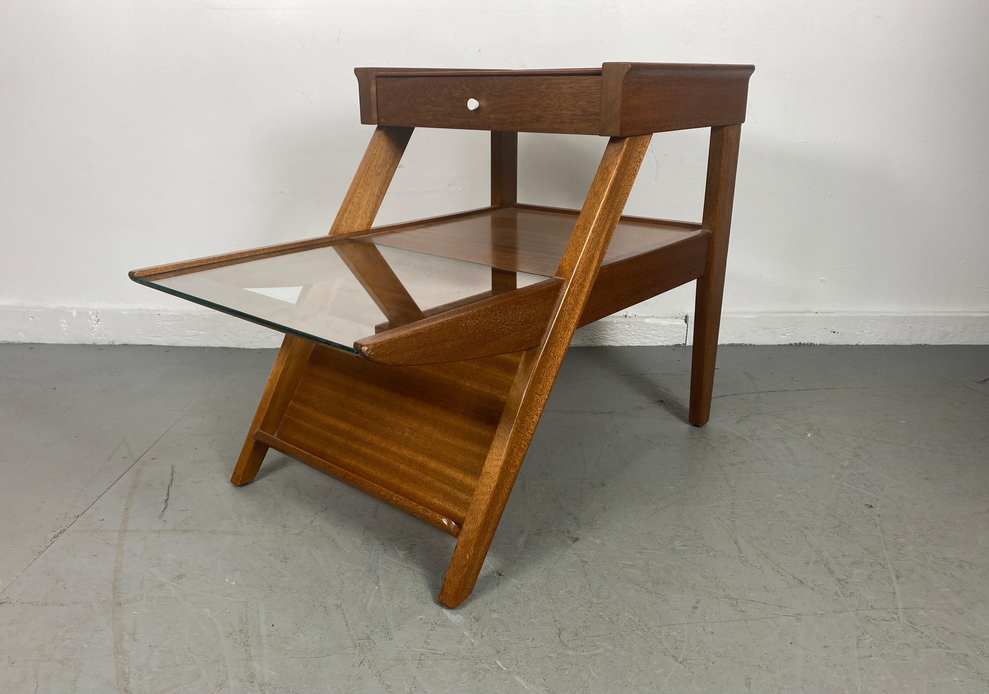 side/ end magazine table designed by John Keal for Brown Saltman. Stunning ribbon mahogany, Seldom seen version with drawer, Classic modernist design.