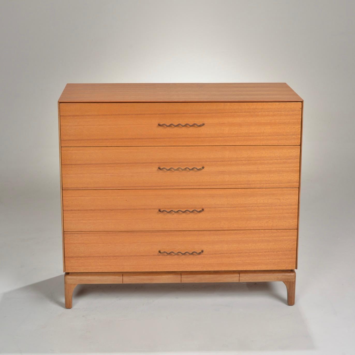 John Keal for Brown Saltman Mid-Century Modern mahogany highboy dresser with four drawers and maker's mark.




  