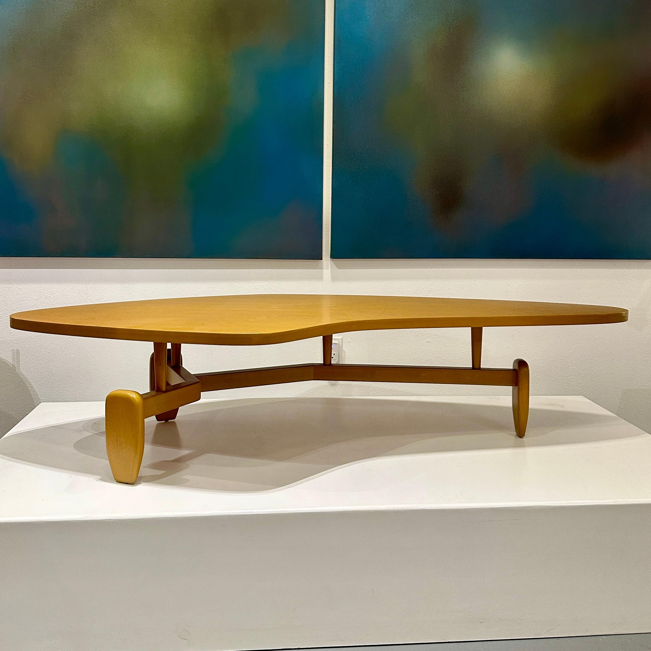 John Keal for Brown Saltman Mahogany Biomorphic Outrigger Coffee Table, ca 1950s

Large and unique biomorphic coffee table designed by John Keal for Brown Saltman of California in the 1950s. This is one of those iconic tables that many people