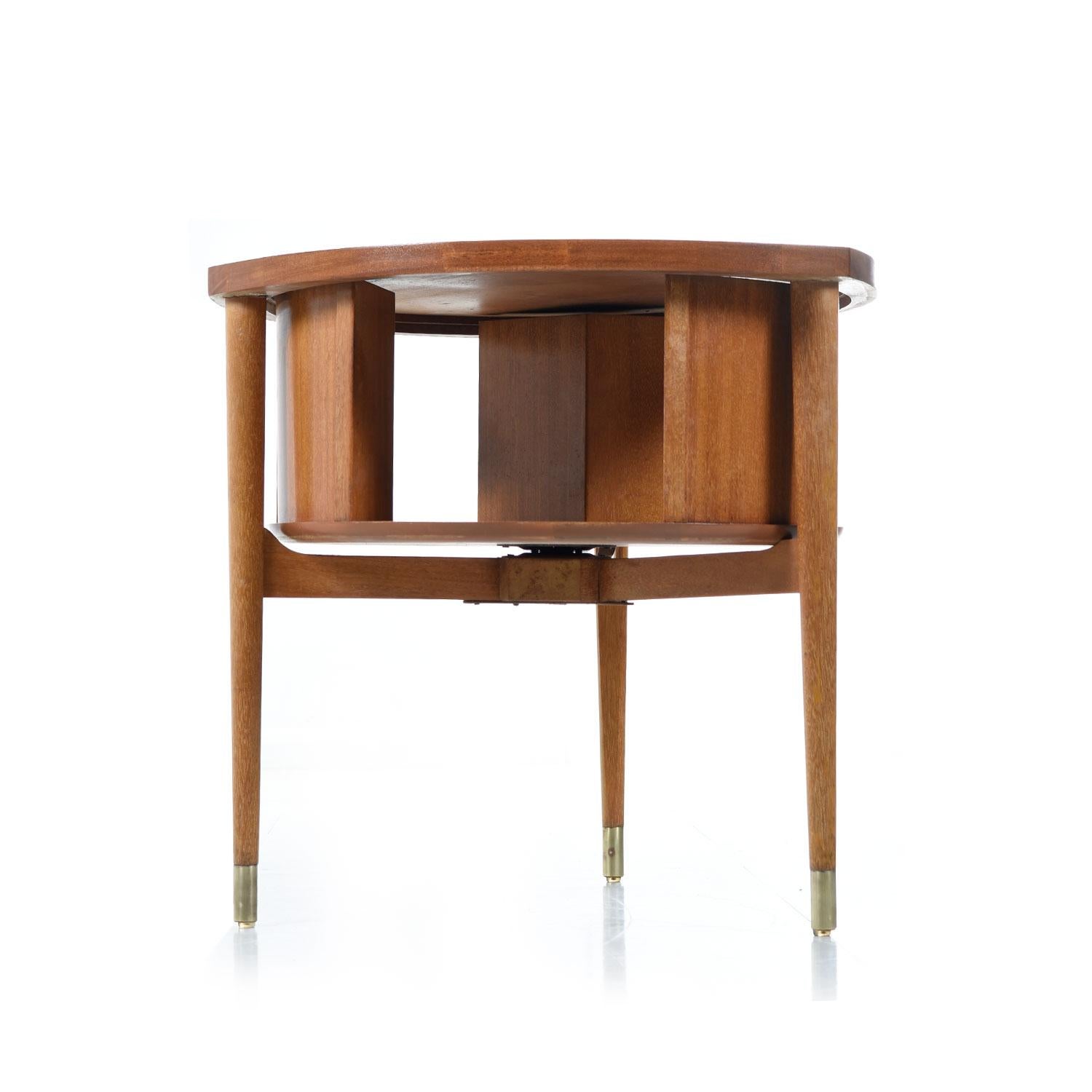 We purchased this John Keal drum table from the original estate and can say without hesitation that you won't find a more pristine set anywhere. The Florida waterfront home was a veritable living catalog for Brown-Saltman. Please look close at our