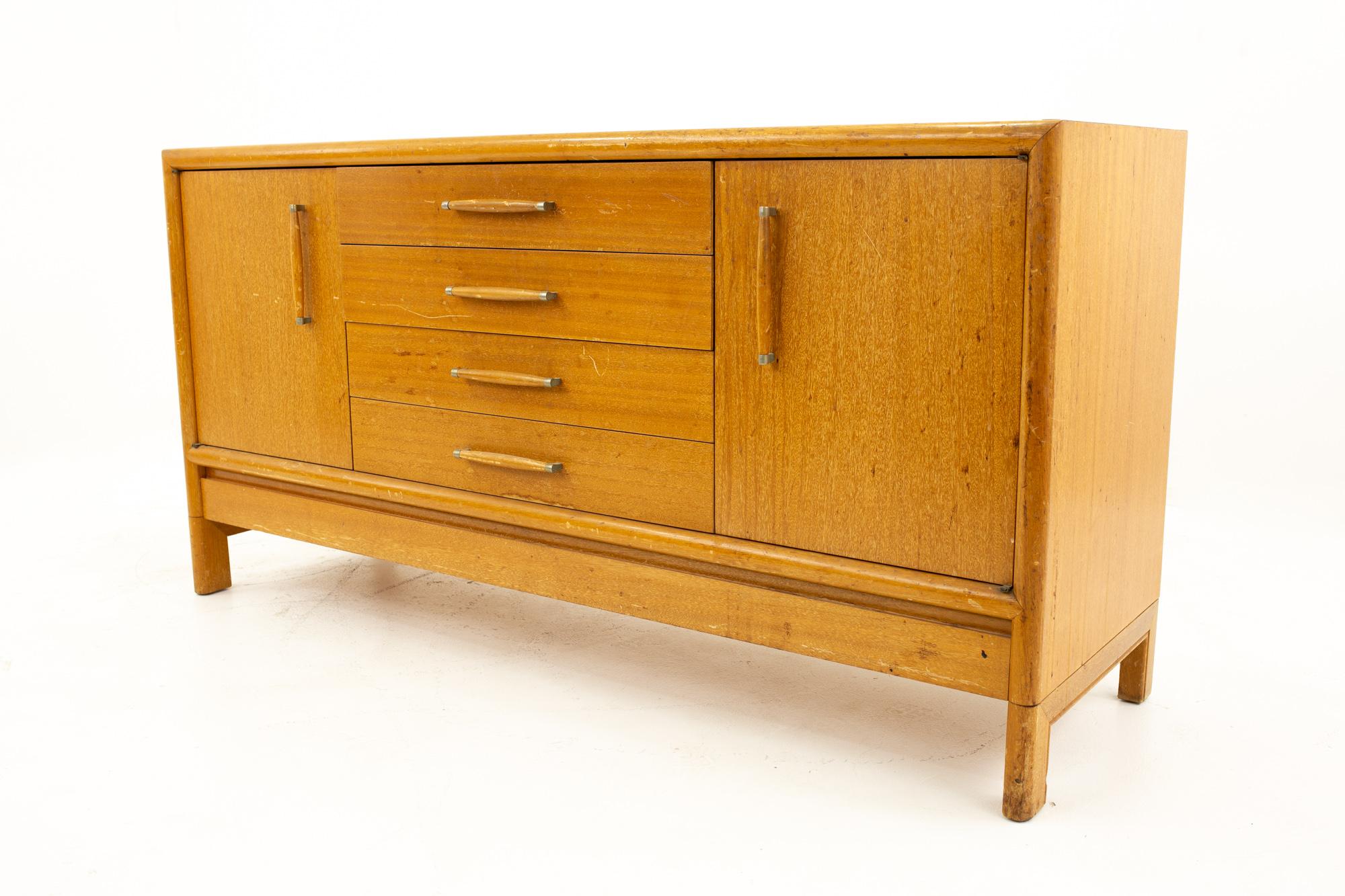 John Keal for Brown Saltman mahogany mid century credenza.
Credenza measures: 66 wide x 20 deep x 33 high

All pieces of furniture can be had in what we call restored vintage condition. That means the piece is restored upon purchase so it’s free