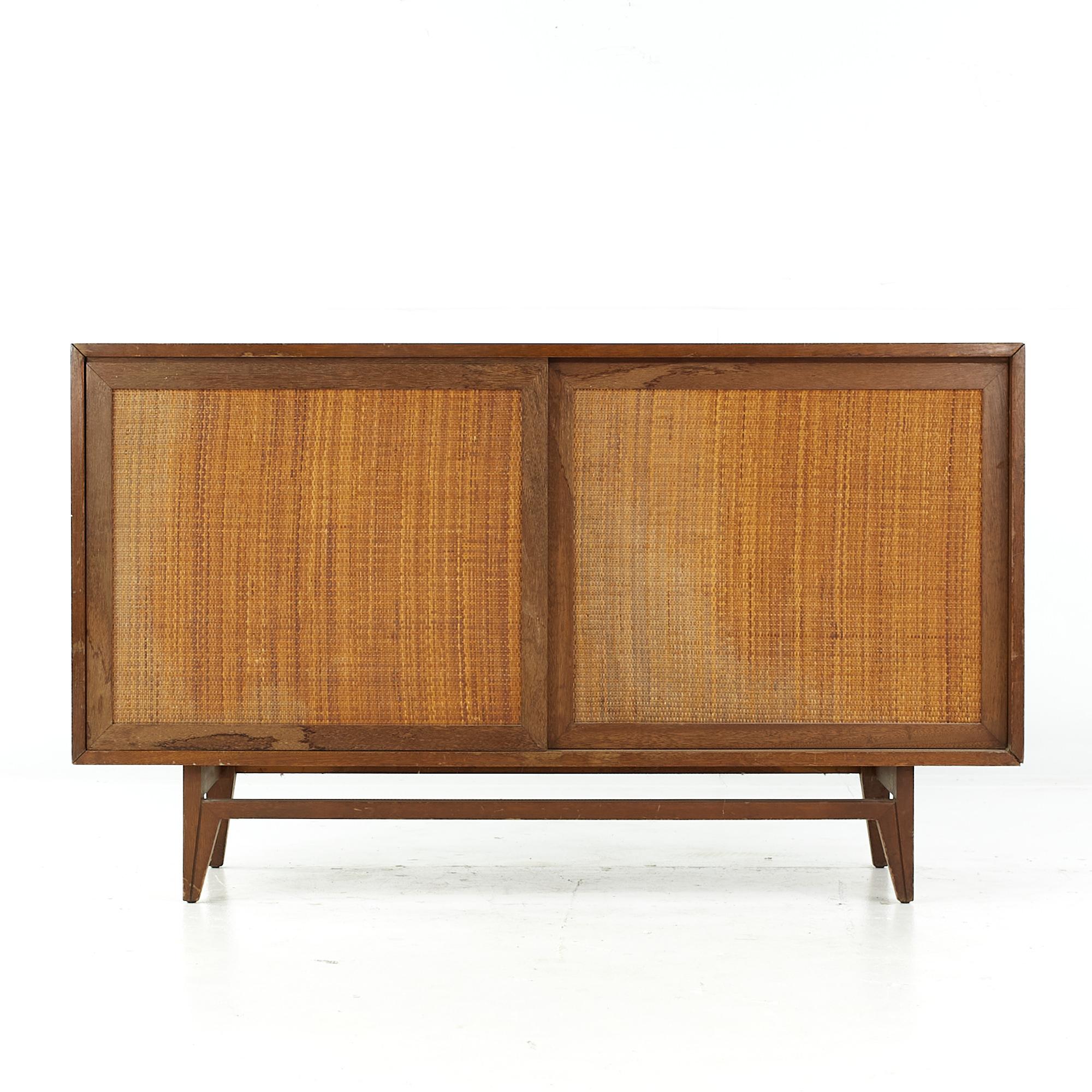 John Keal for Brown Saltman midcentury cane lowboy.

This lowboy measures: 54 wide x 18 deep x 32 inches high.

All pieces of furniture can be had in what we call restored vintage condition. That means the piece is restored upon purchase so it’s