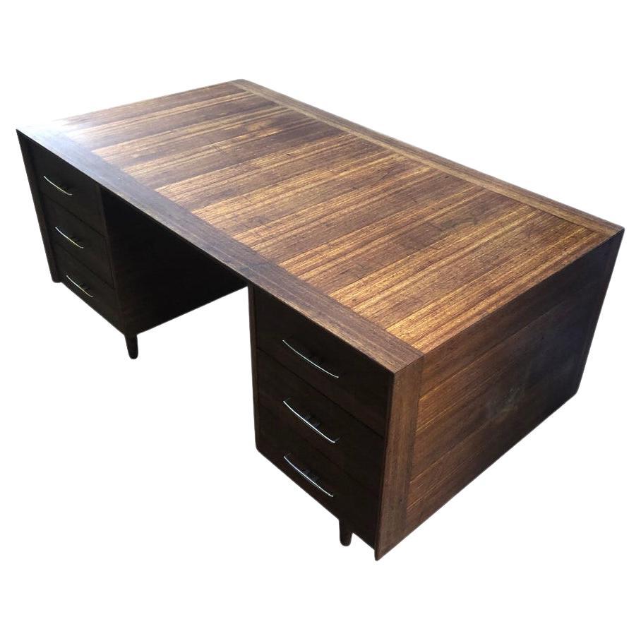 This desk belongs in a museum, with perfect proportions, incredible craftsmanship, beautiful walnut woodwork and a spectacular overall design. A gem rarely seen and loved from all true connaisseurs.