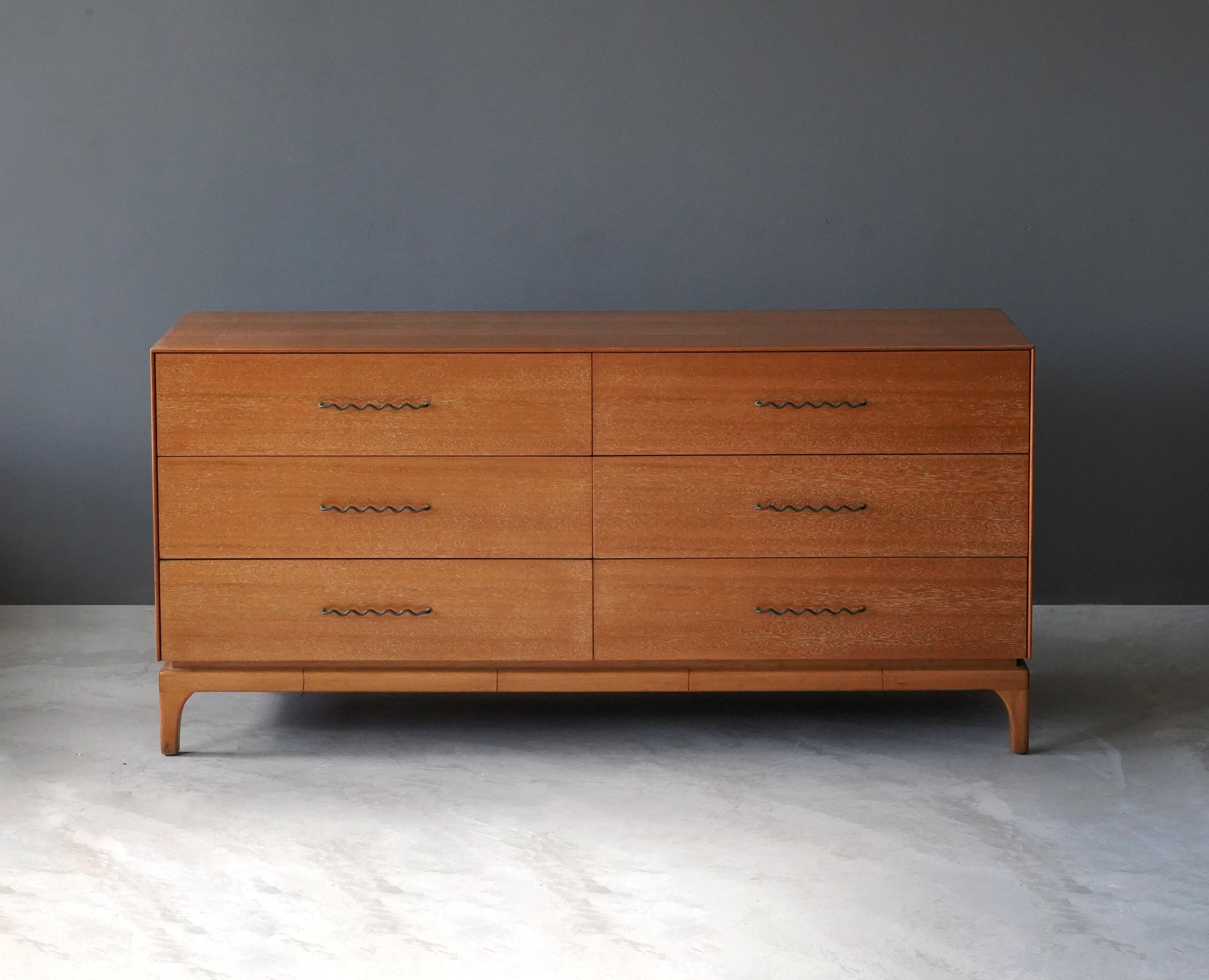 A double dresser / chest of drawers / cabinet. Designed by John Keal, for Brown Saltman, 1950s, United States. Marked.

Other notable American designers of the era include Edward Wormley, Harvey Probber, T.H. Robsjohn Gibbings.






 