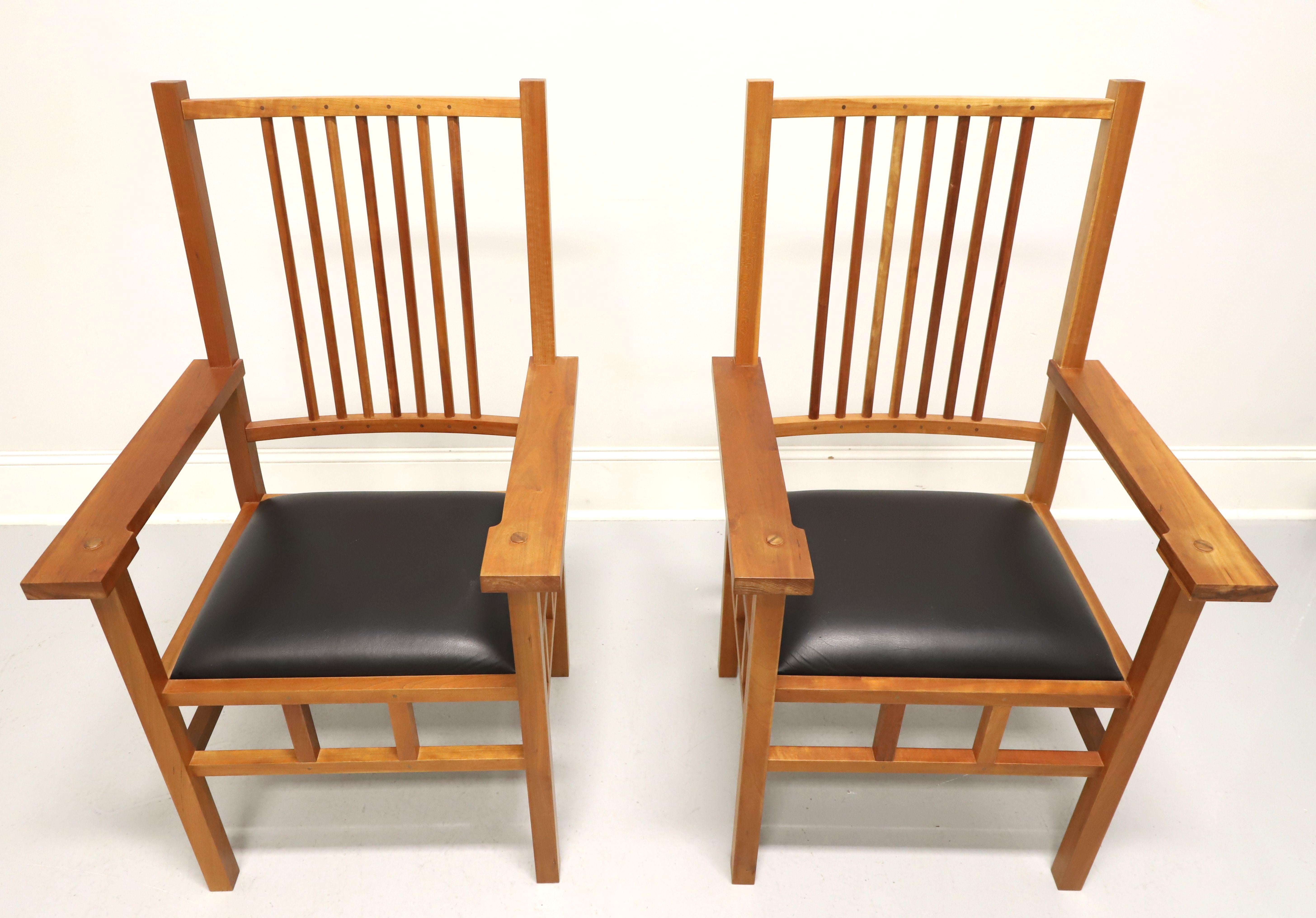 A pair of Mission / Arts & Crafts style armchairs by John Kelly Furniture, the J-02B Spindle Armchair, from their J1 Series. Solid black cherry with black walnut peg detailing to the crest rail & lower rail at the spindle joints, spindle backs,