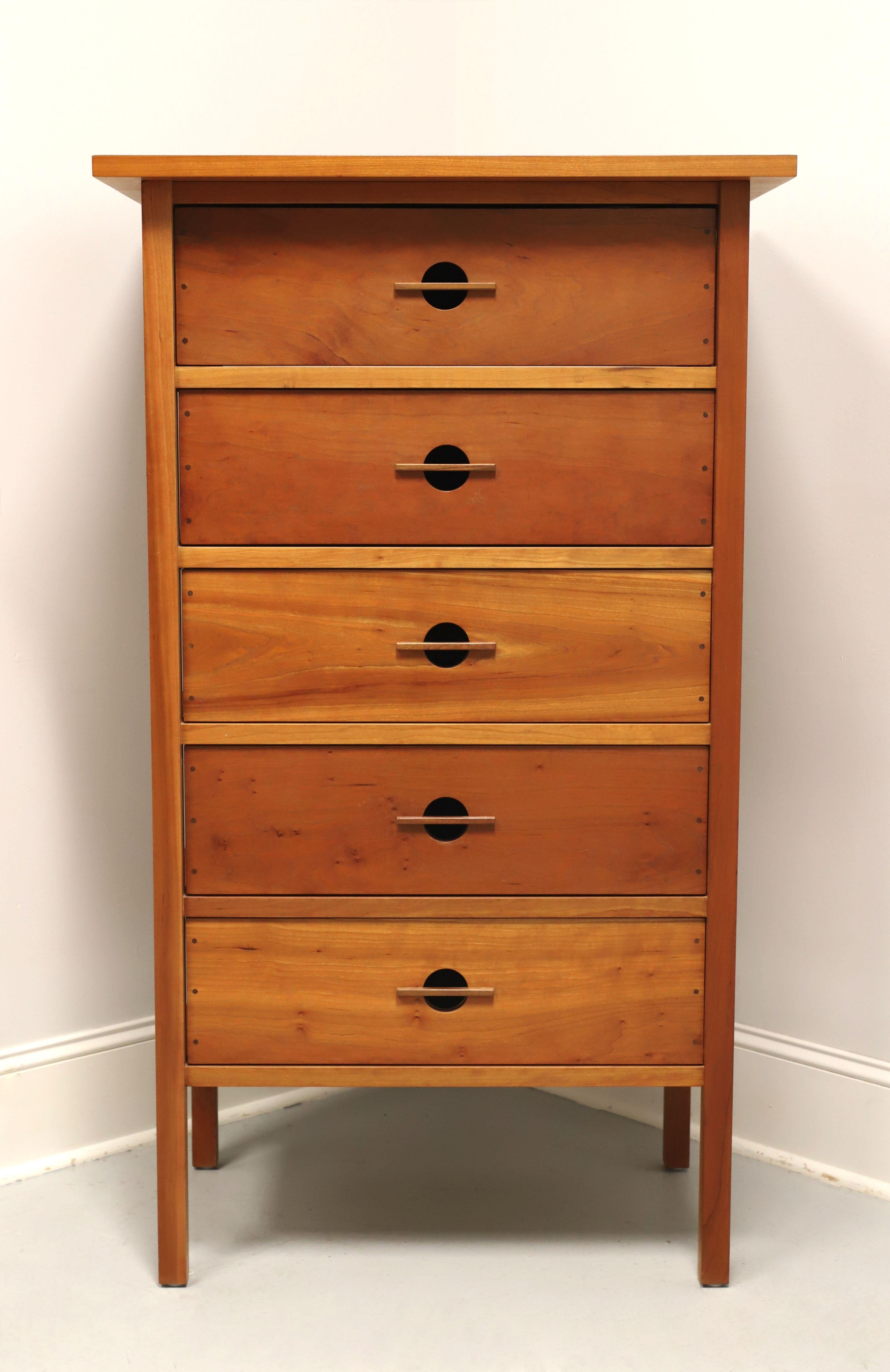 A Mission / Arts & Crafts style tall chest of drawers by John Kelly Furniture, the J-27 Tallboy, from their J1 Series. Solid black cherry with black walnut peg detailing to drawers, square edge overhanging top, signature exposed structural frame,