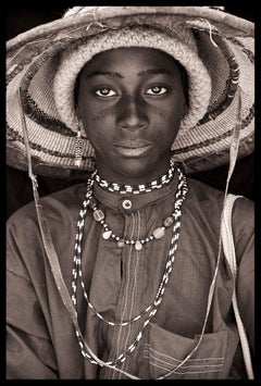 Fula Shepherd Boy by John Kenny.  26.5 x 18" portrait with Acrylic Face-Mount