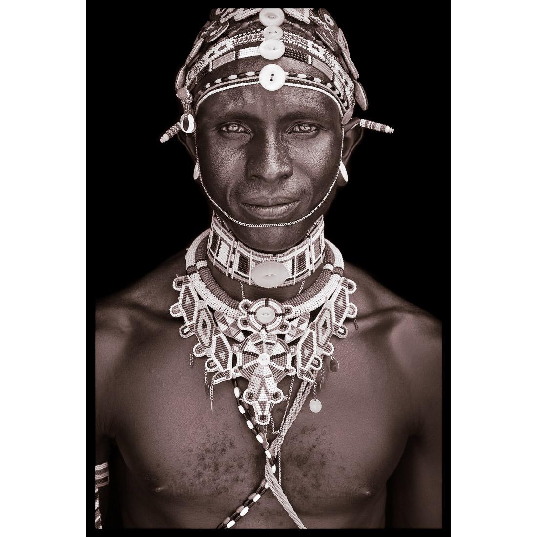 A portrait of Kakuwsa, a Rendille man from northern Kenya in 2019.

John Kenny’s work is all shot on location in some of the remotest corners of Africa. His images are all taken with natural light and his subjects in their day to day attire.

The