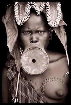 Mursi traditions by John Kenny.  36 x 24" portrait photo with Acrylic Face-Mount