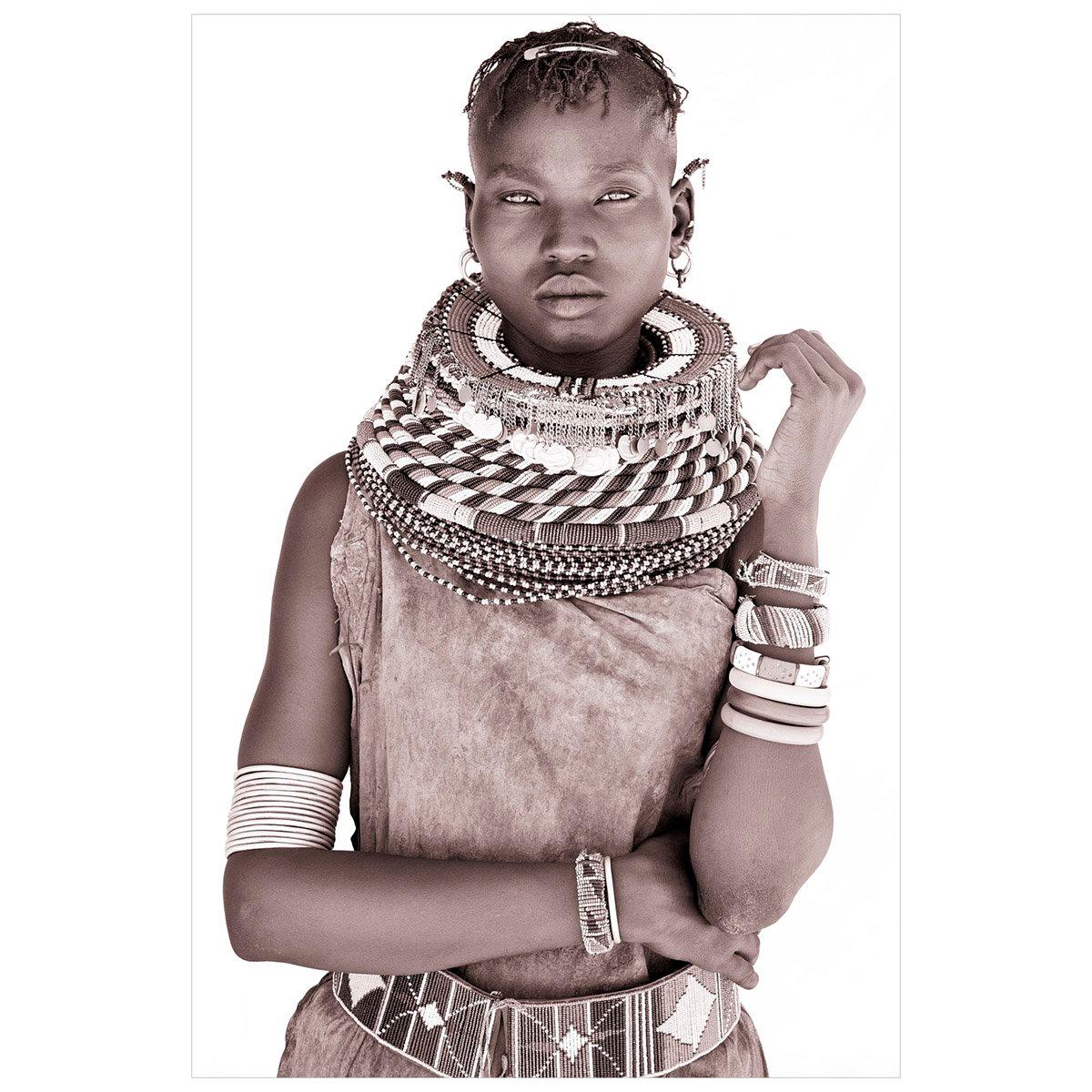 This young Turkana girl in northern Kenya wears a goatskin known as an ‘egolas’. In traditional Turkana communities the inhabitants are excellent at making garments from animals, and skins undergo a process lasting several days that involves drying,