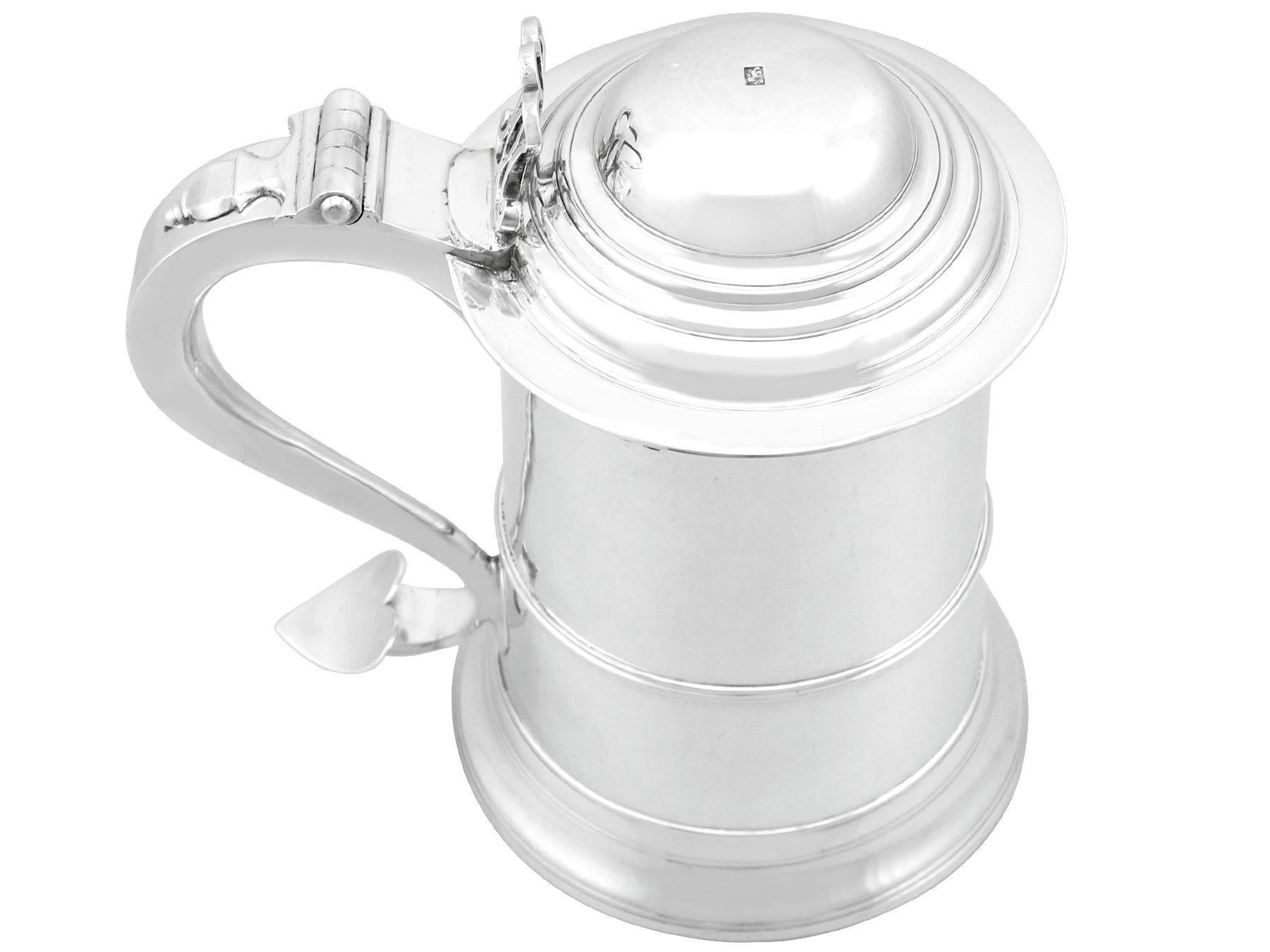 An exceptional, fine and impressive antique George III Newcastle sterling silver quart tankard made by John Langlands I & John Robertson I; an addition to our Georgian silver tankard collection.

This exceptional antique Georgian sterling silver