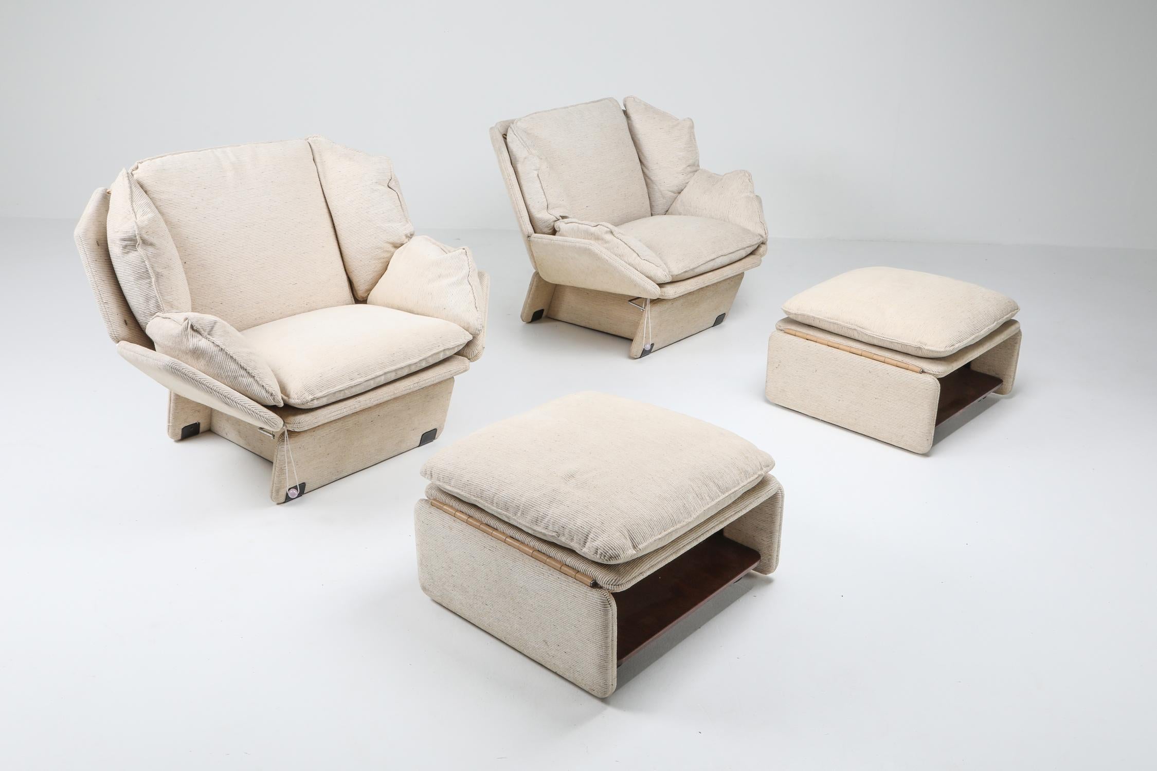 Postmodern pair of lounge chairs with ottoman, Italy, 1970s

Unusual pair of lounge chairs who'd fit perfectly with the architectural John Lautner Goldstein house.
The lounge chairs have a reclining mechanism, and include an ottoman each.
The
