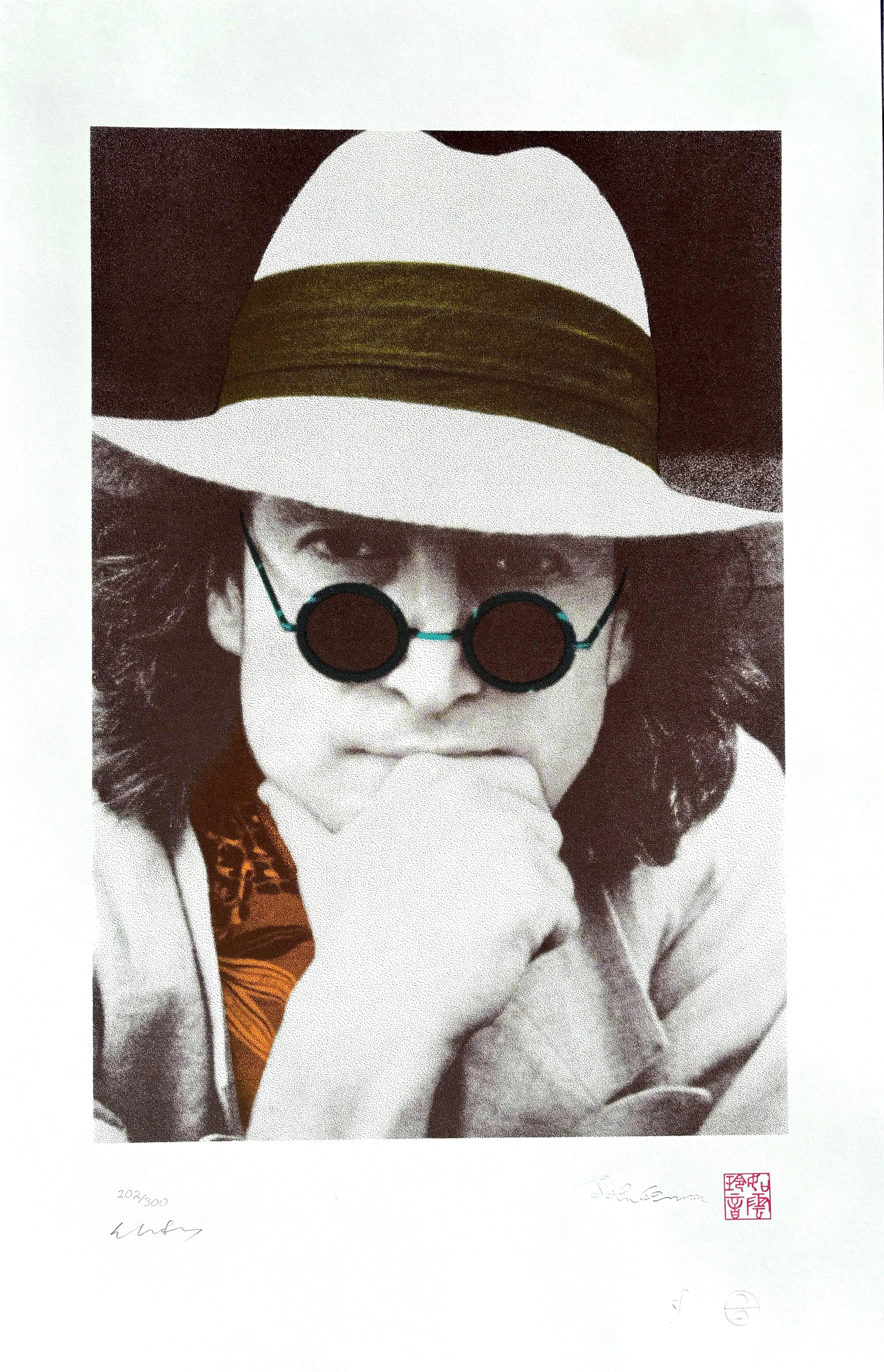   Limited Edition Serigraph of John Lennon's portrait. The original photograph was taken by the Lennon's personal photographer in Japan in 1977.  The silkscreens were added by Yoko Ono Lennon and hand pulled on the serigraph.. This limited edition