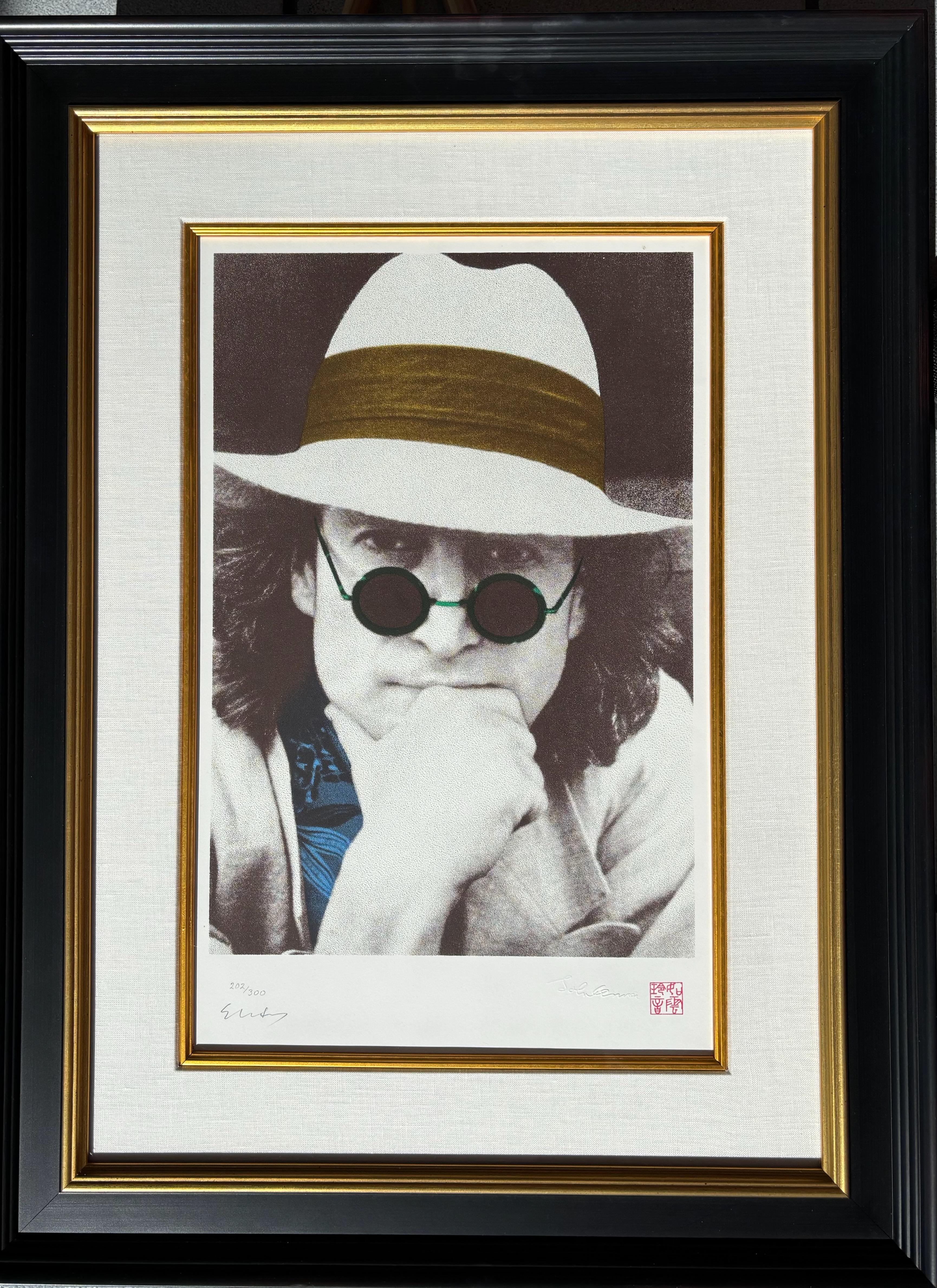   Limited Edition Serigraph of John Lennon's portrait. The original photograph was taken by the Lennon's personal photographer in Japan in 1977.  The silkscreens were added by Yoko Ono Lennon and hand pulled on the serigraph.. This limited edition
