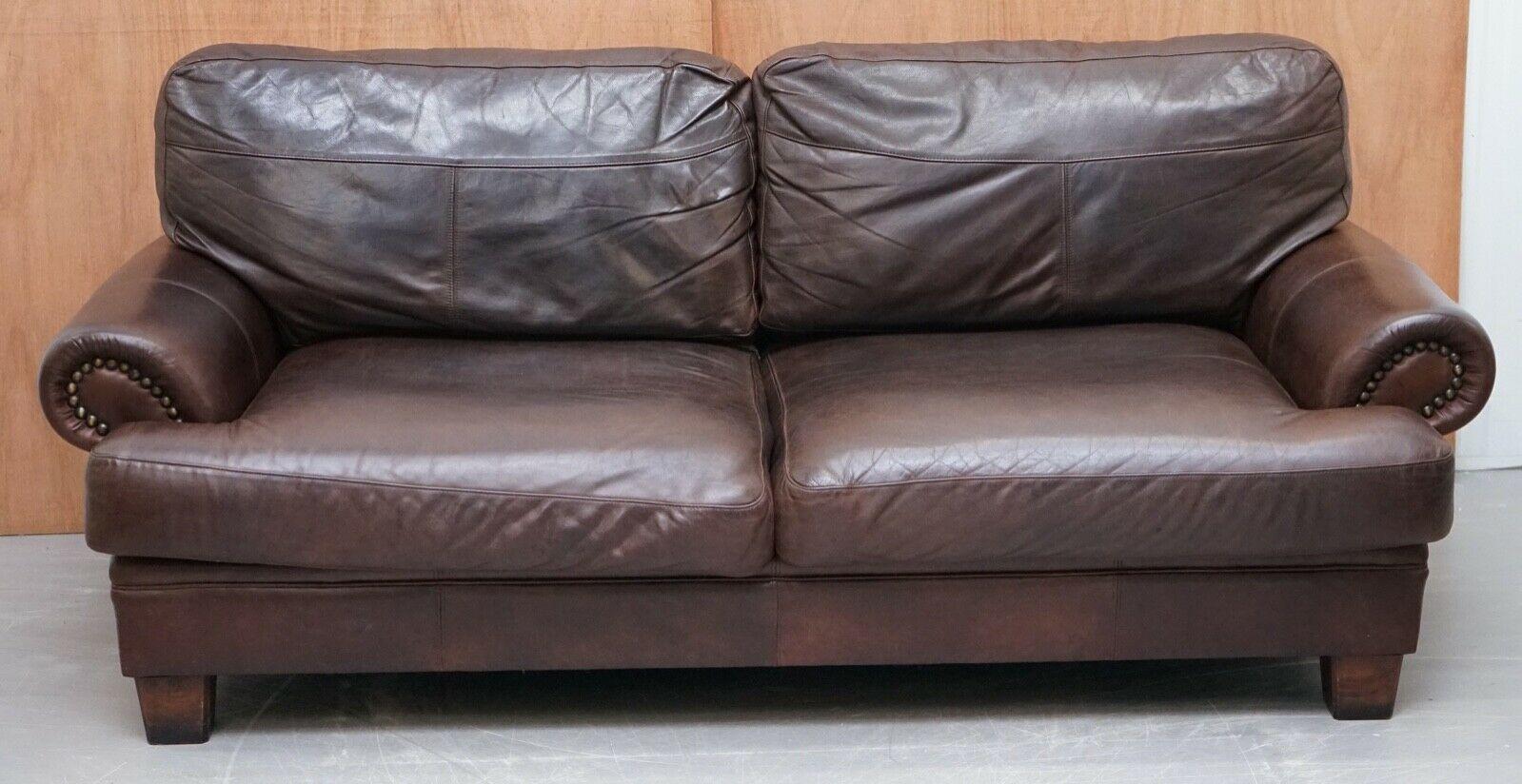 We are delighted to sell this beautiful John Lewis three seater sofa in the colour brown chocolate leather, this sofa is in a very good condition but please do see the pictures carefully as well as they form part of the description. 

We have