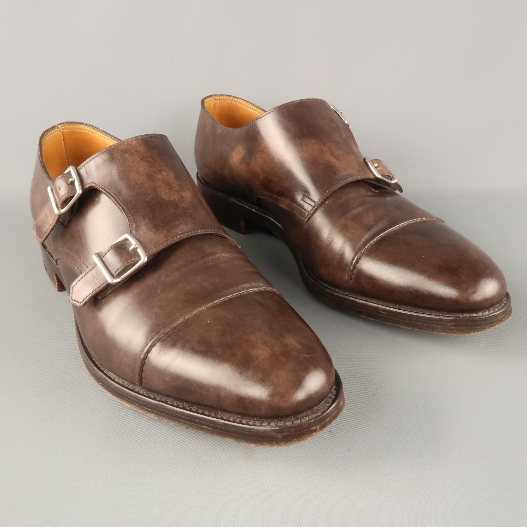 JOHN LOBB WILLIAM II Loafers Shoes comes in a brown tone in an antique style  leather material, featuring a double monk, straps, a pointed toe and a leather insole and outsole. Made in England.
 
Excellent Pre-Owned Condition.
Marked: 9E
 
Outsole: