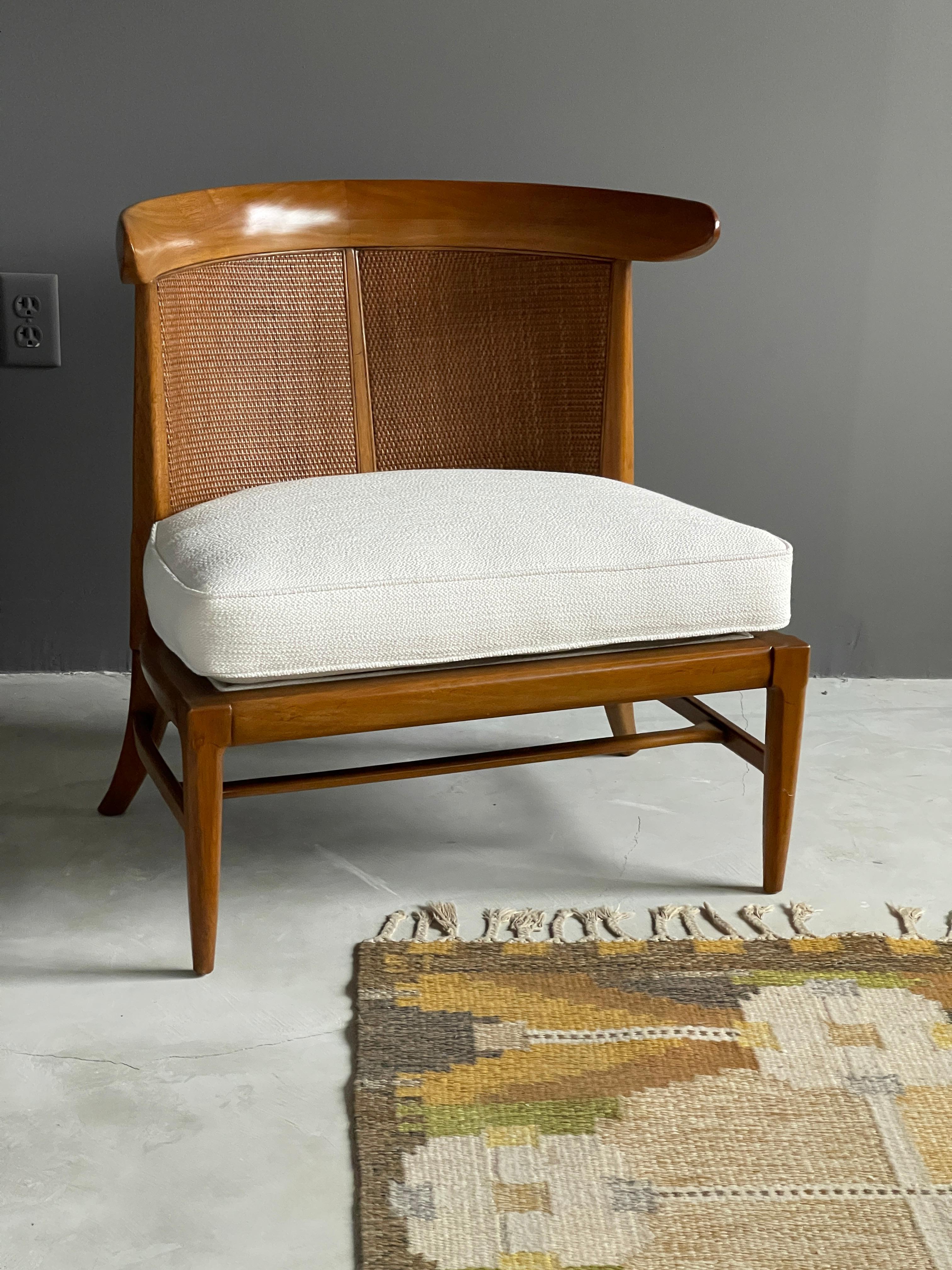 A walnut lounge chair with original cane or rattan braided backs and fabric cushions. Designed by John Lubberts & Lambert Mulder for Tomlinson collection, America, circa 1950.

Other American designers of the era include Edward Wormley, T.H.