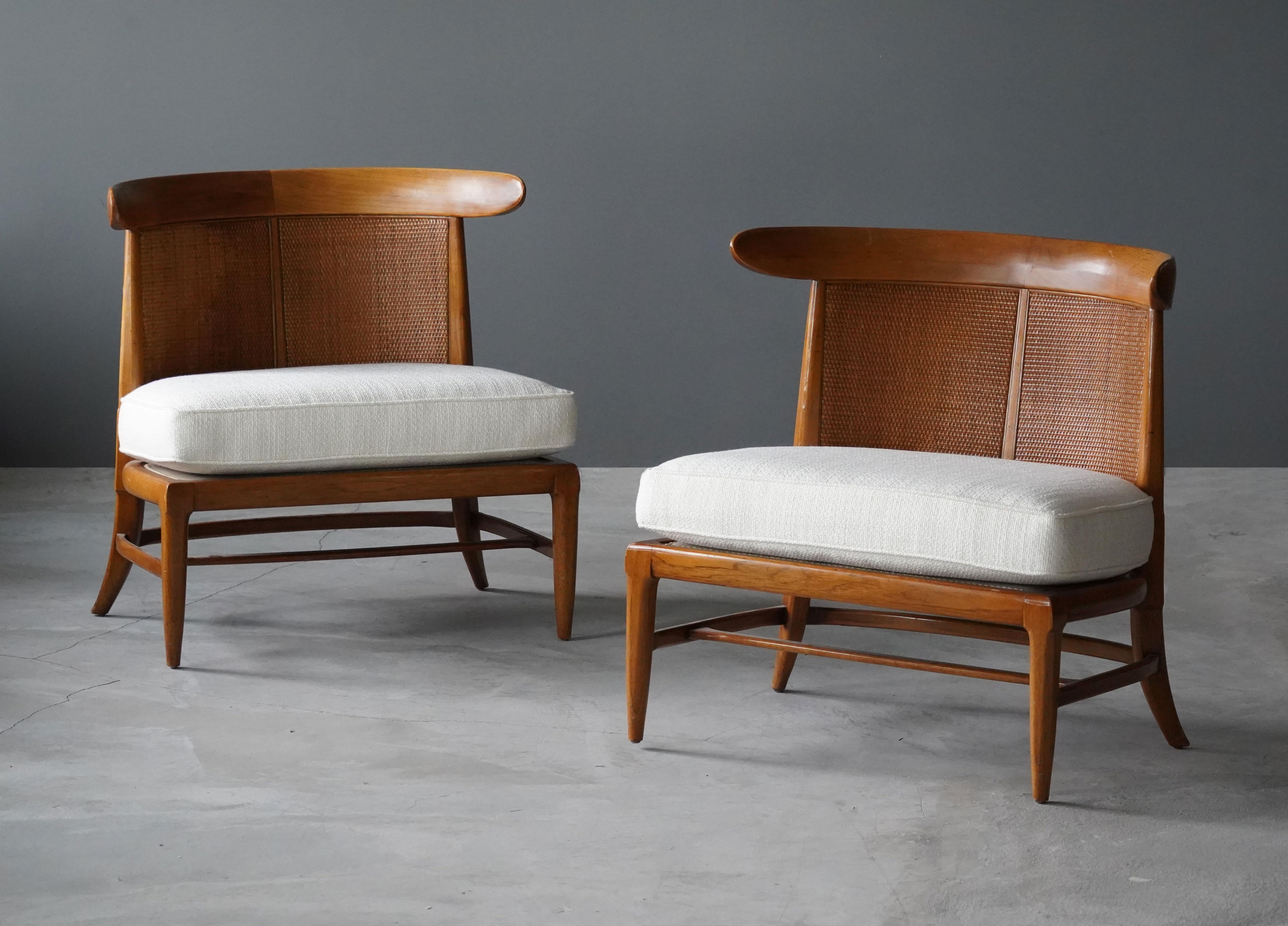A pair of walnut lounge chairs with original cane or rattan braided backs and fabric cushions. Designed by John Lubberts & Lambert Mulder for Tomlinson collection, America, circa 1950.

Other American designers of the era include Edward Wormley,