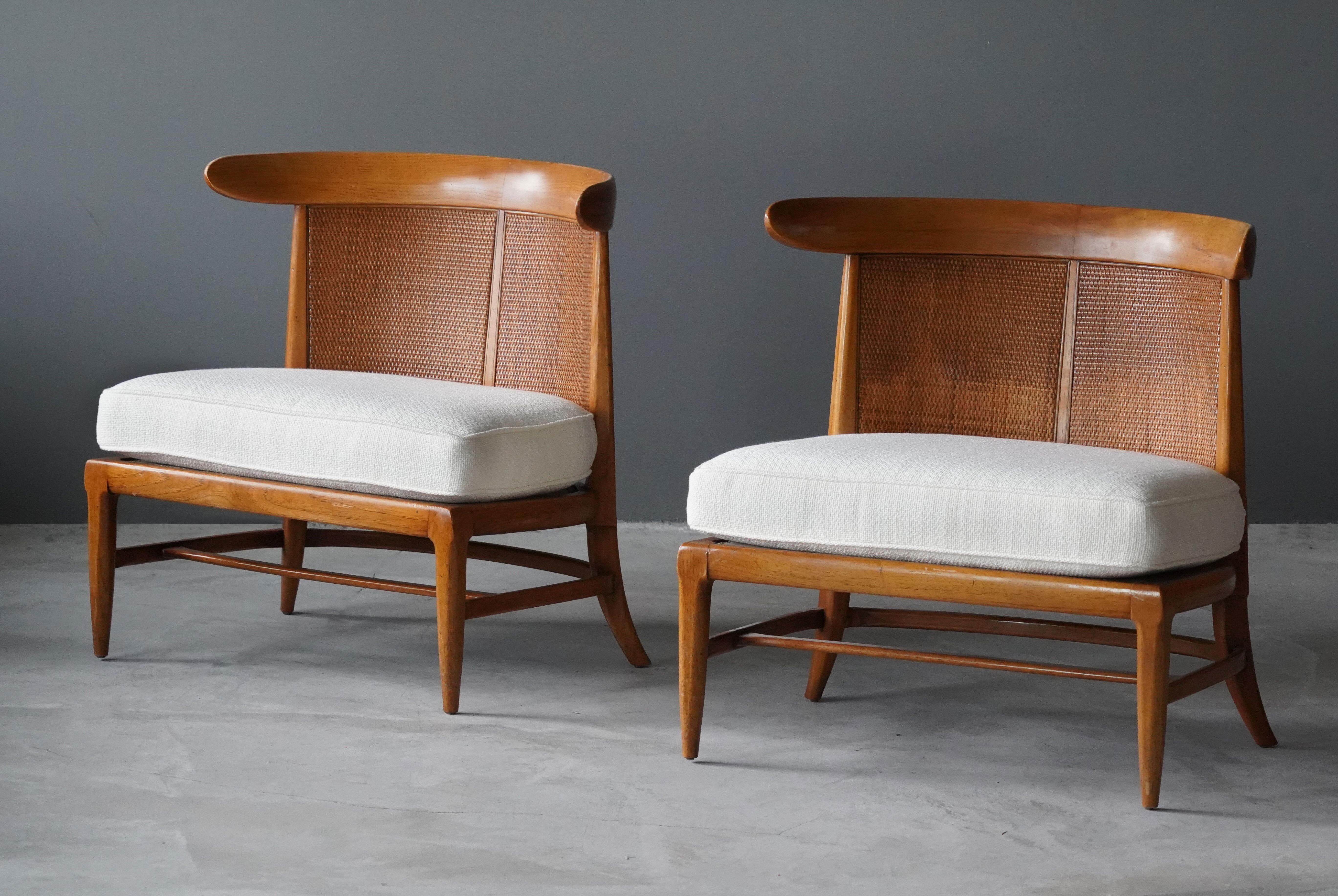 A pair of walnut lounge chairs with original cane or rattan braided backs and fabric cushions. Designed by John Lubberts & Lambert Mulder for Tomlinson collection, America, circa 1950.

Other American designers of the era include Edward Wormley,