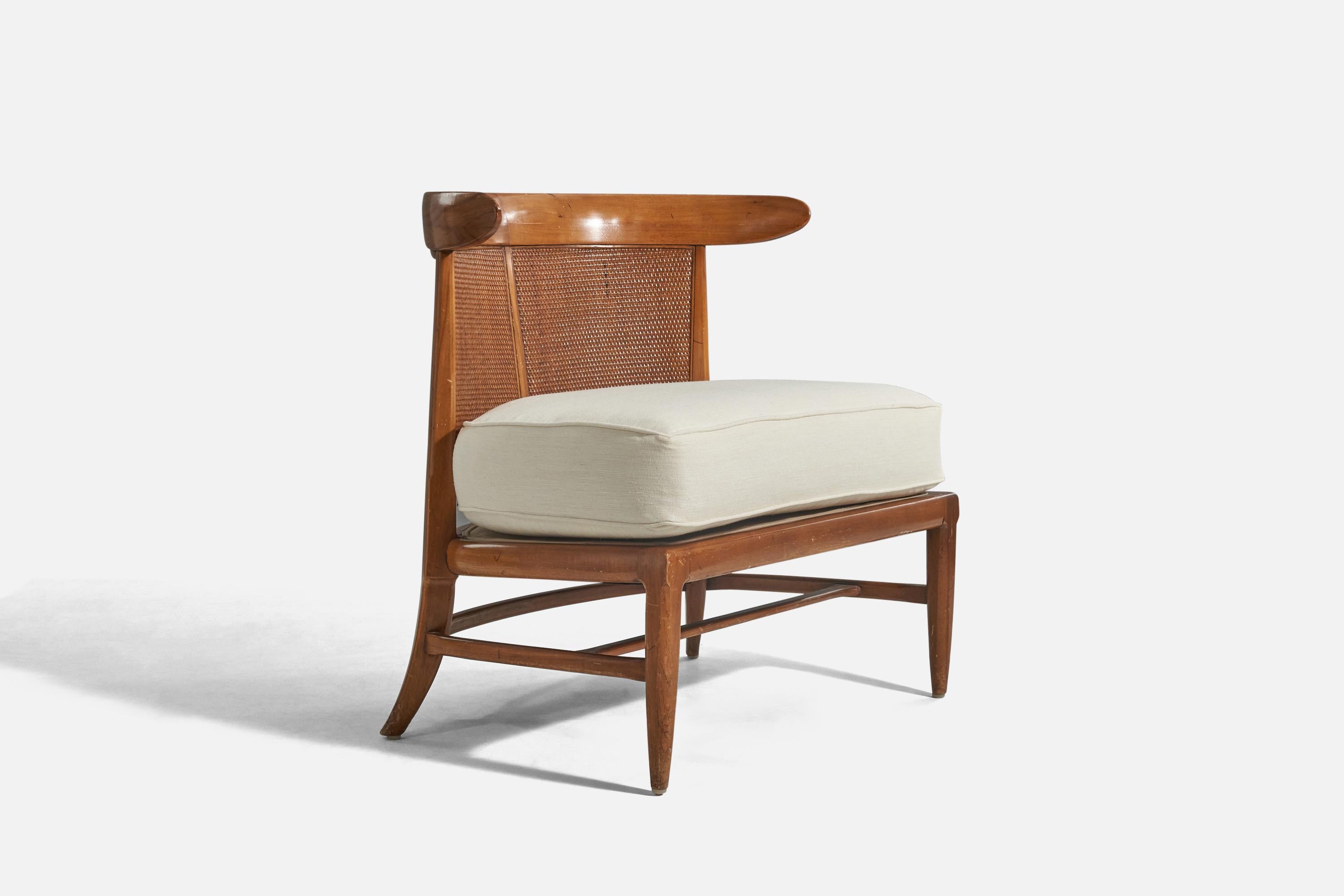 A walnut, cane and white fabric slipper chair designed by John Lubberts & Lambert Mulder and produced by Tomlinson, USA, circa 1950.

