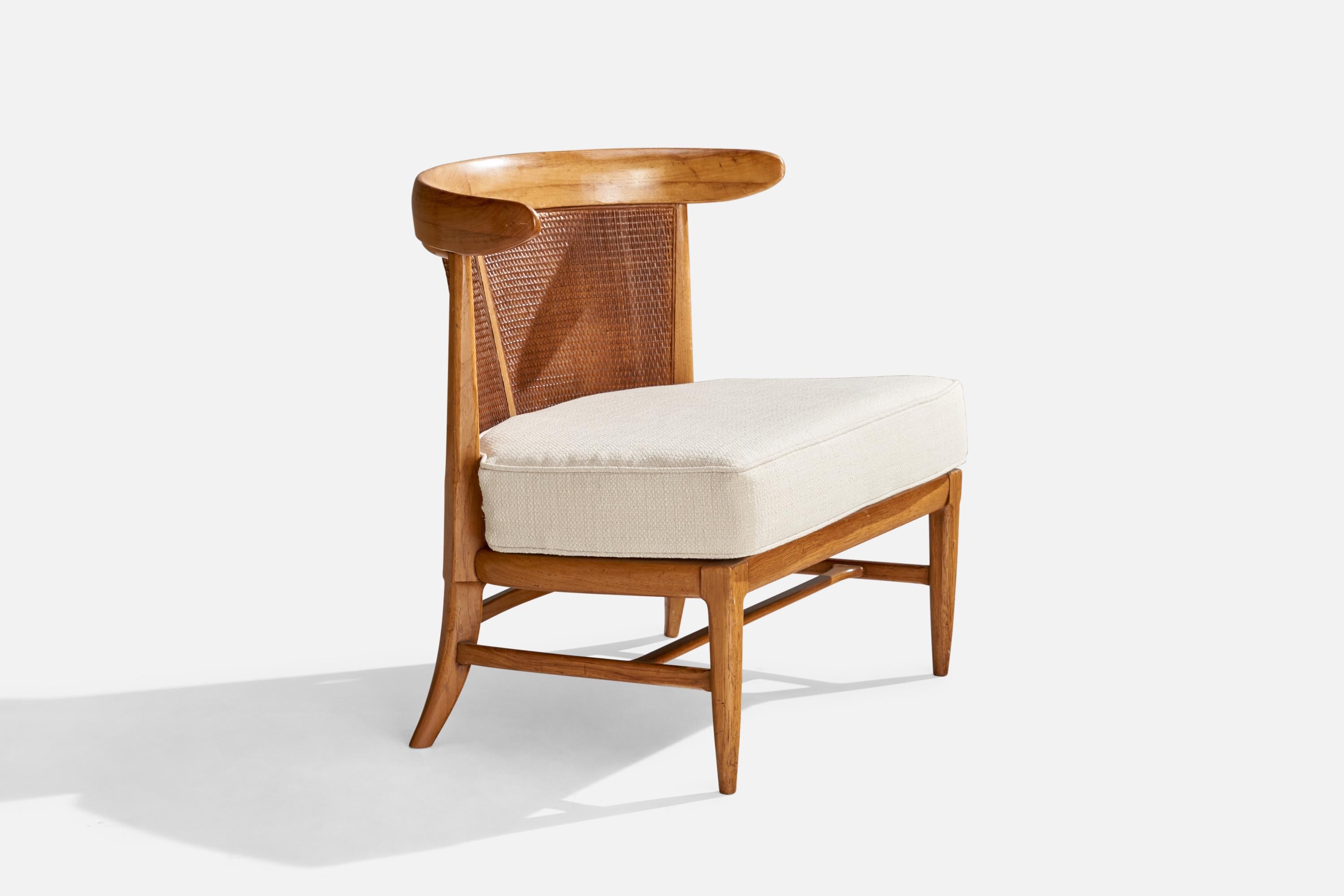 A walnut, cane and white fabric slipper chair designed by John Lubberts & Lambert Mulder and produced by Tomlinson, USA, 1950s.

Seat height 17”.
