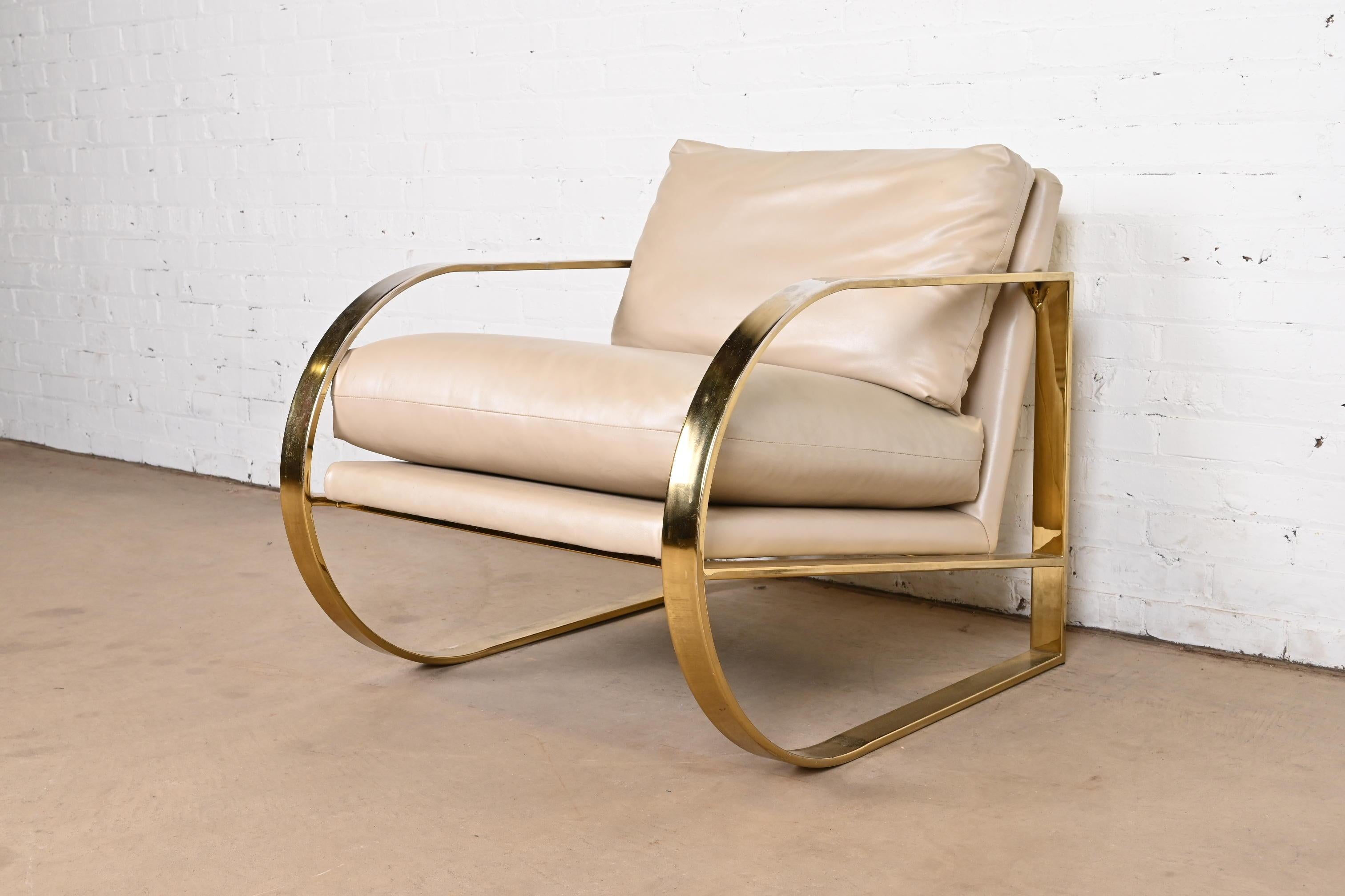 A gorgeous Mid-Century Modern lounge chair

By John Mascheroni for Swaim Originals

USA, Circa 1970s

Brass plated steel frame, with upholstered leather seat and back.

Measures: 28