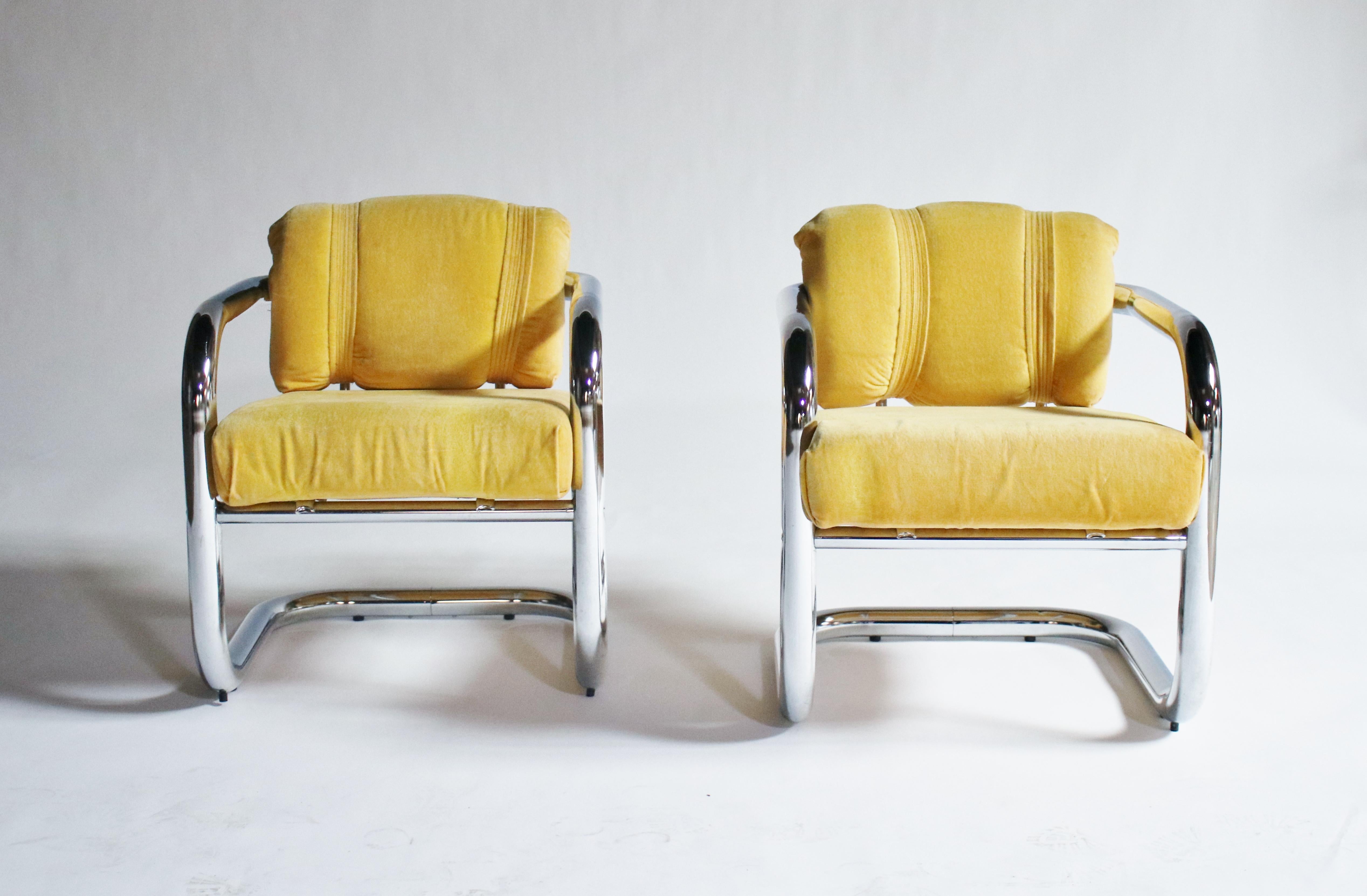Pair of all 1970s tubular chrome cantilevered armchairs attributed to John Mascheroni with all original yellow removable cushions.