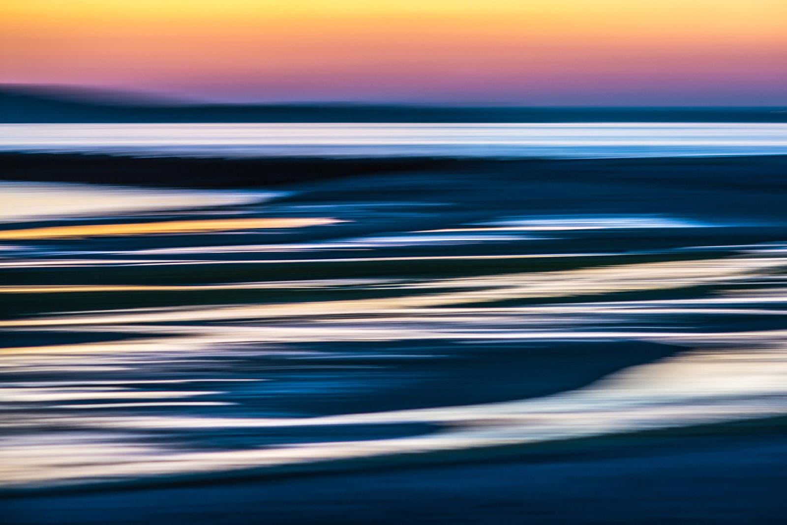 Impressionistic photo of an autumn sunset reflected in tidal flats at low tide. Shot in Glen Cove, Long Island. 

Printed on archival fine art paper, mounted on dibond aluminum with a float mount backing. Available in a wide variety of custom sizes,