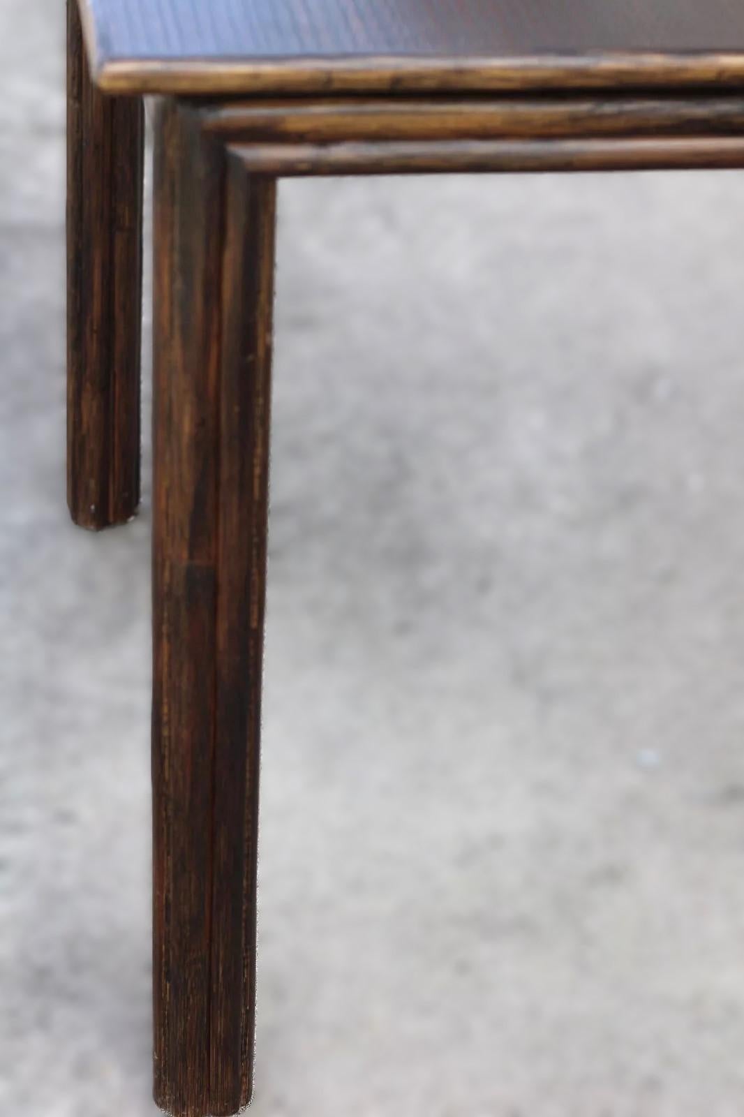 Authentic McGuire Oak and Rattan Bamboo Game Table designed by John McGuire for McGuire San Francisco. Tabletop has a beautiful fine linear oak grain and is finished in a rich dark tobacco brown. Rattan poles enhance the tabletop edges, apron and