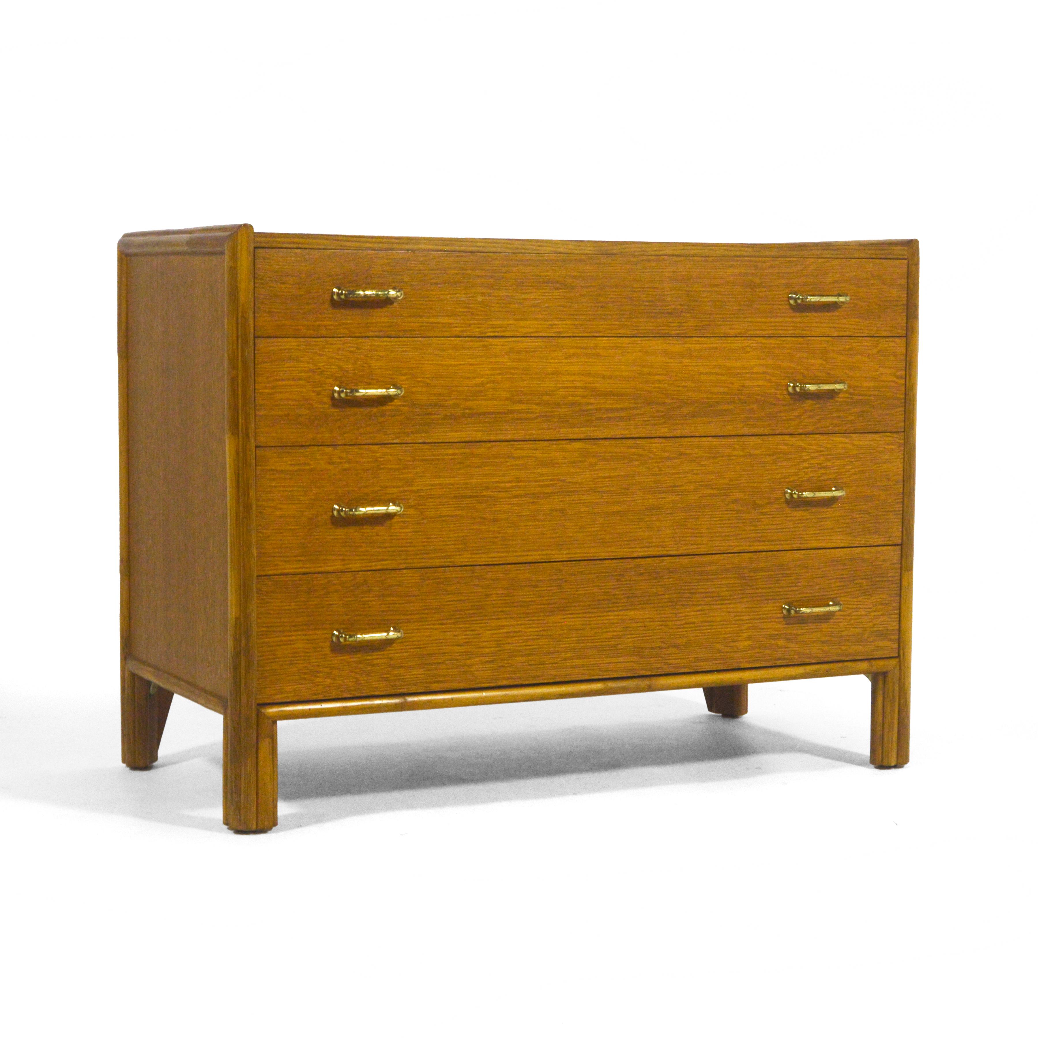 John McGuire designed chest in oak and rattan with brass pulls for McGuire of San Fransisco, the company he started with his wife Elinor.  McGuire furniture is made to last generations. Not only is the design tasteful and understated, the quality is