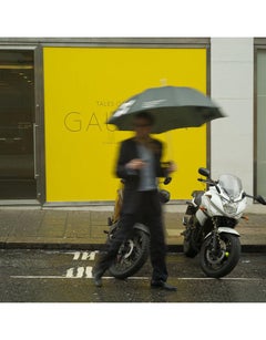 Umbrella Yellow in London by John Migicovsky