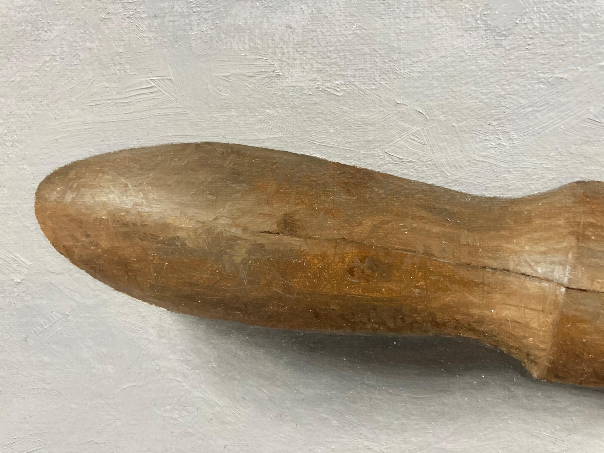 Une peinture à l'huile d'un outil ancien, un Garden Dibble, qui est un long outil en forme de bâton utilisé pour faire des trous pour les graines, afin de s'assurer qu'elles sont suffisamment enfouies dans le sol sans être endommagées. Cet objet