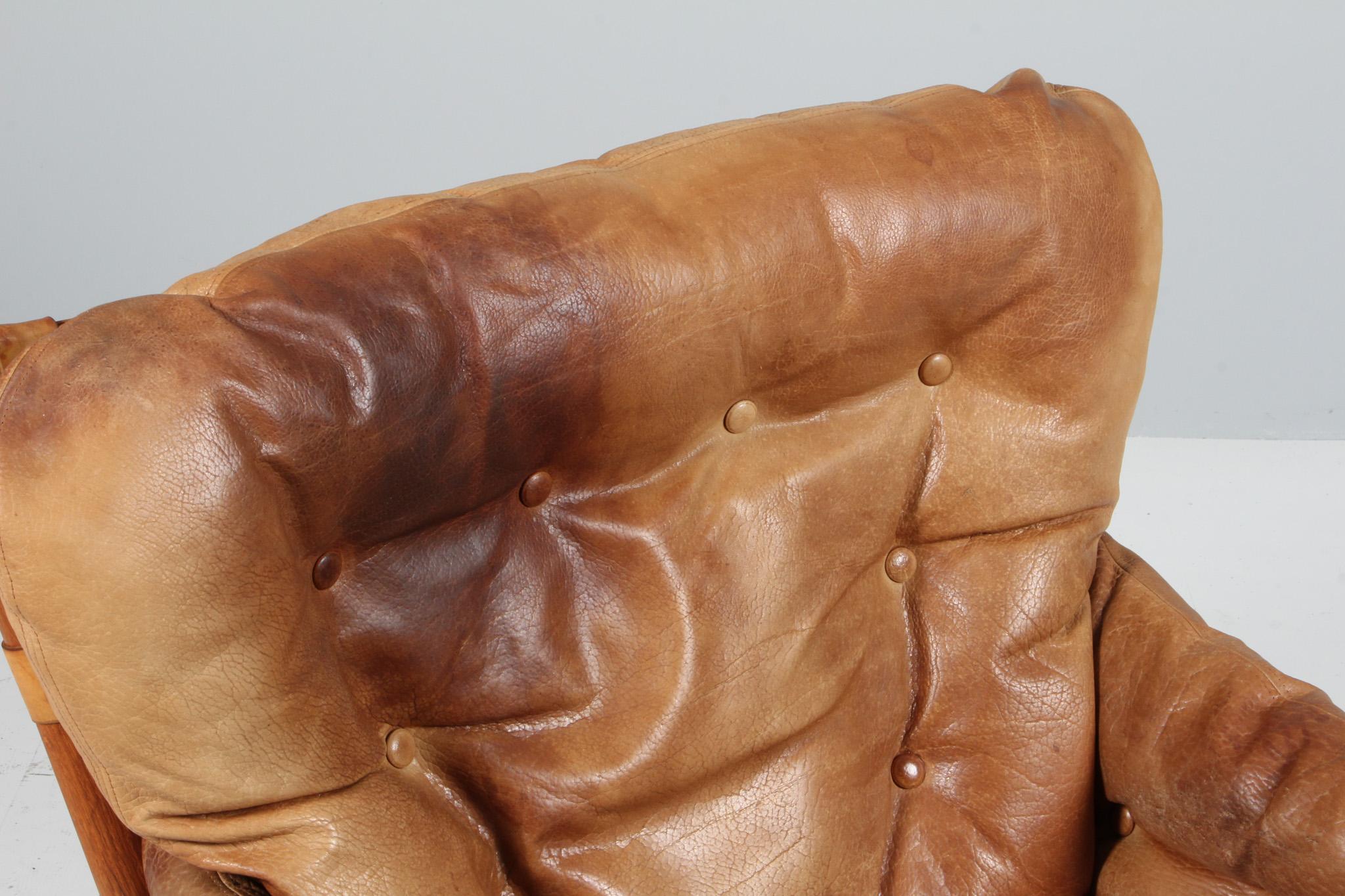 Danish John Mortensen for Magnus Olsen, brutalist lounge chair, oak and leather.