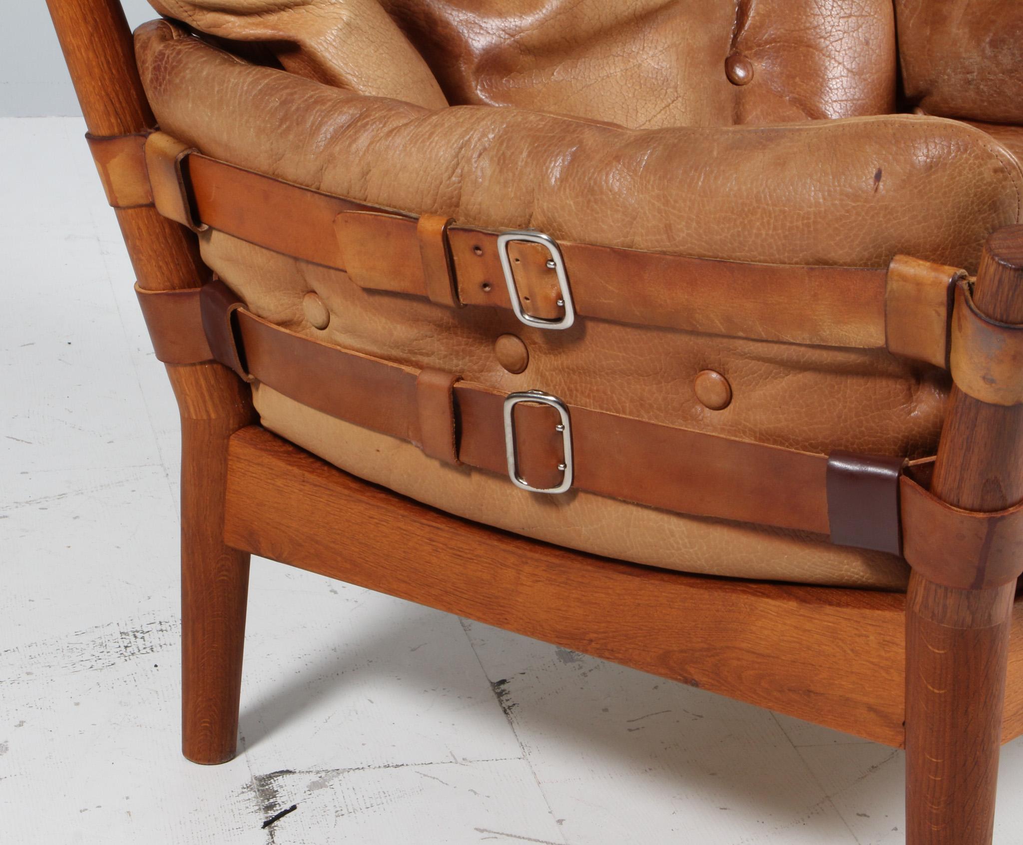 Late 20th Century John Mortensen for Magnus Olsen, brutalist lounge chair, oak and leather.
