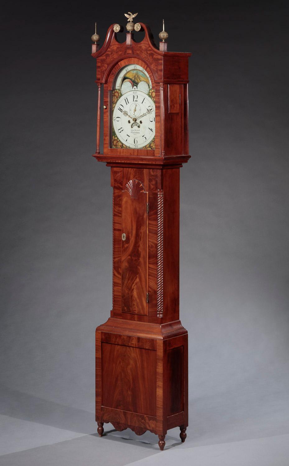 Horloge à grande caisse de Feders
Fabriqué et signé par John Nicholl, (1784-1862)
Belvidere, New Jersey      Circa 1825
Bois primaire : Acajou, placages d'acajou, cerisier
Bois secondaires :  Pin blanc

Hauteur :  91 1/2 pouces
Largeur :  18
