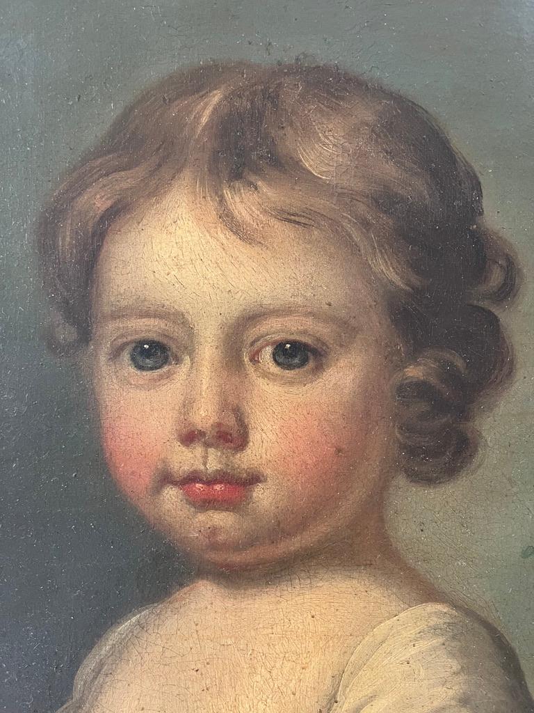 Ein charmantes Porträt eines jungen Mädchens, das im originalen, handgeschnitzten Goldholzrahmen präsentiert wird. 

Kreis von John Opie (1761-1807)
Porträt eines jungen Mädchens, halbe Länge
Mit altem Label auf der Rückseite
18 x 16½ Zoll ohne