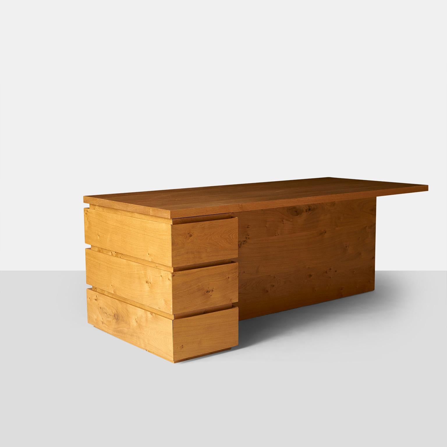John Pawson Minimalist desk
A one of a kind partners desk by John Pawson. Solid oak top with base made of solid elm. Partners style desk with three drawers on one side and a single door cabinet on the other. Clean minimal styling and highest